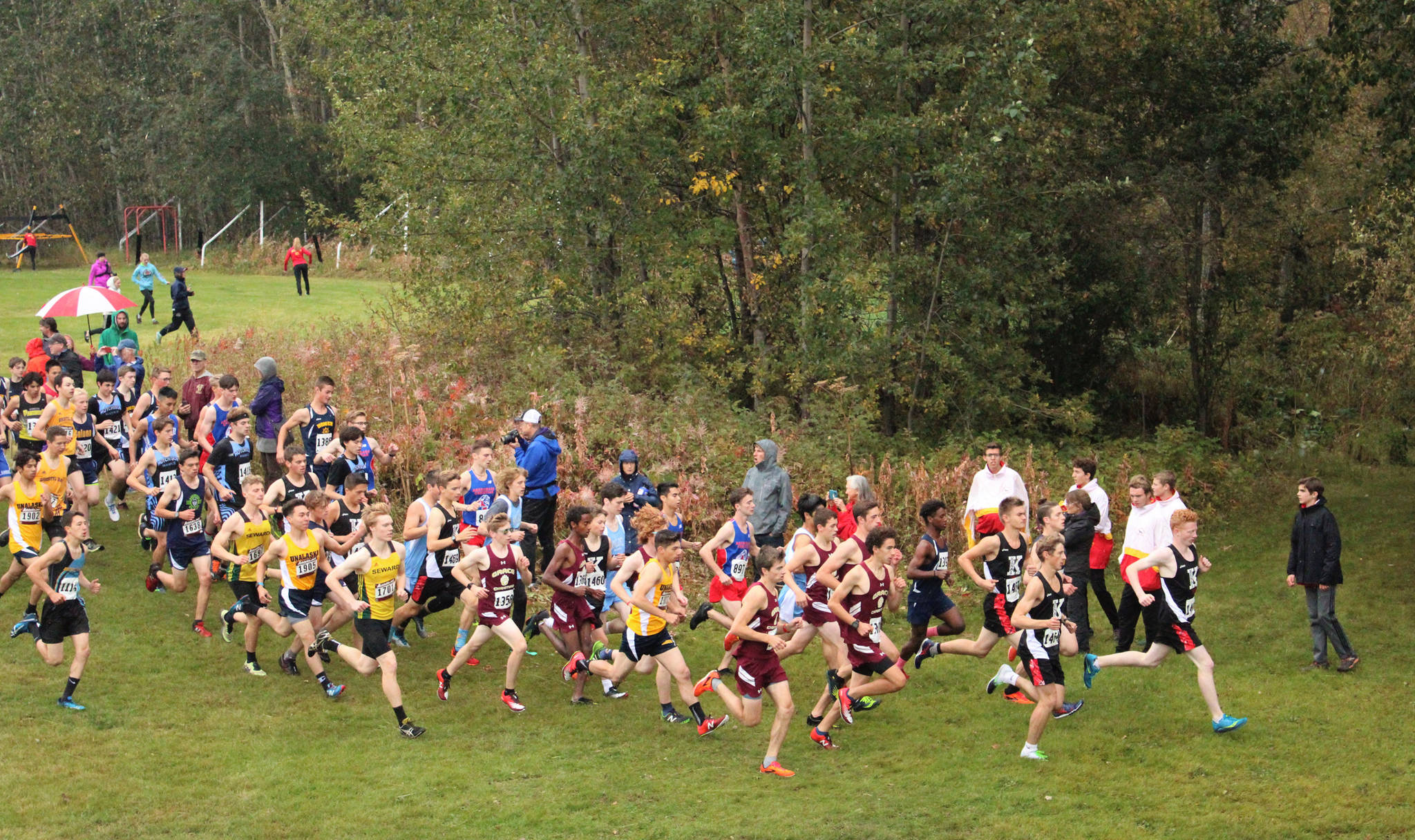 Joe Hamilton leads the mass start during the Division II race of the Palmer Invitational on Saturday, Sept. 7, 2019. (Photo by Tim Rockey/Frontiersman)