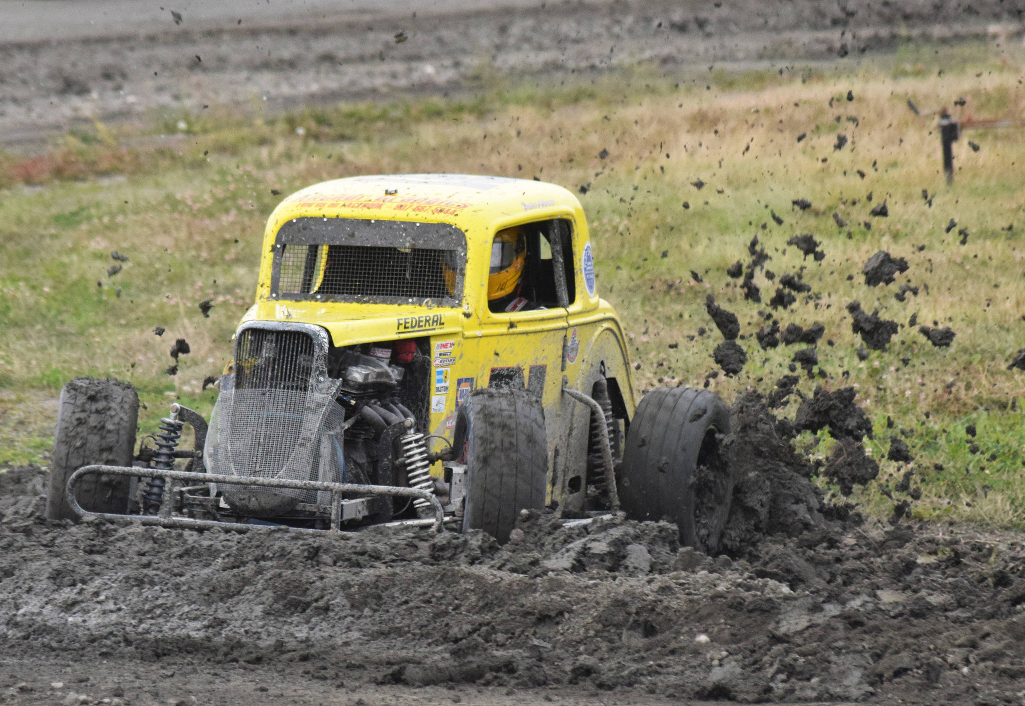 Damien Ackerman spins into the mud during a Legends heat race Friday, Sept. 6, 2019, at Twin City Raceway in Kenai, Alaska. (Photo by Joey Klecka/Peninsula Clarion)