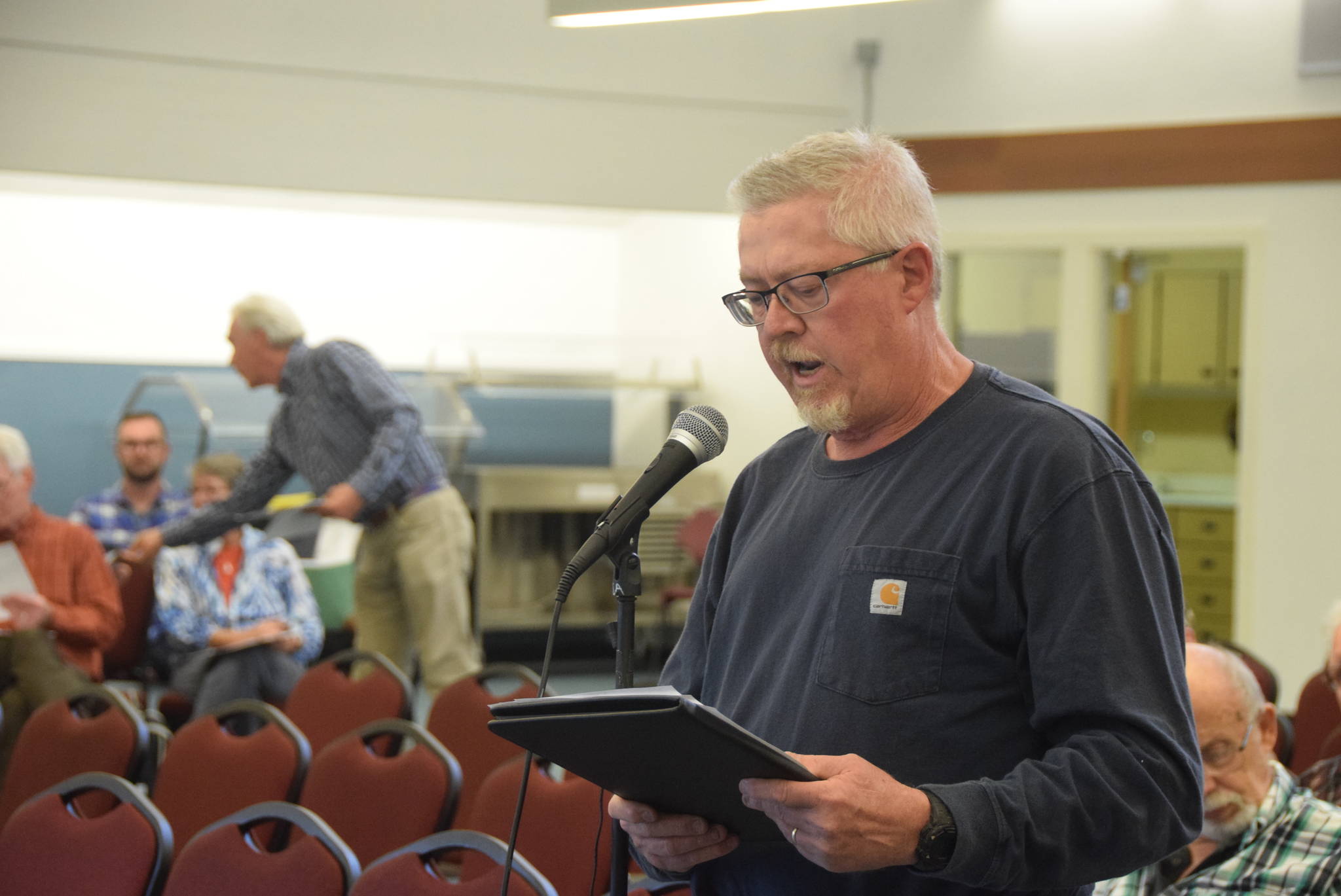 Nikiski resident Bill Bookout speaks to members of the Federal Energy Regulatory Commission regarding the Draft Environmental Impact Statement for the Alaska LNG Project at the Nikiski Community Recreation Center on Sept. 11, 2019. (Photo by Brian Mazurek/Peninsula Clarion)