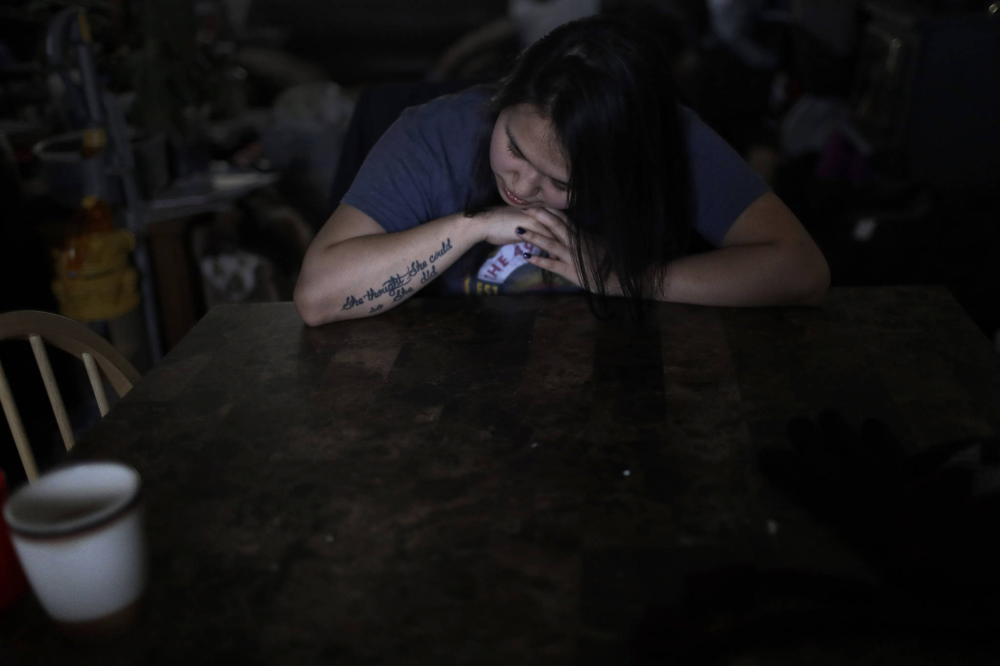 In this Feb. 16, 2019, photo, Deidre Levi rests her head for a moment in her grandmother’s house before a basketball game in the Native Village of St. Michael, Alaska. Levi says she spoke up about being sexually assaulted because she wanted to be a role model for girls in Alaska. (AP Photo/Wong Maye-E)