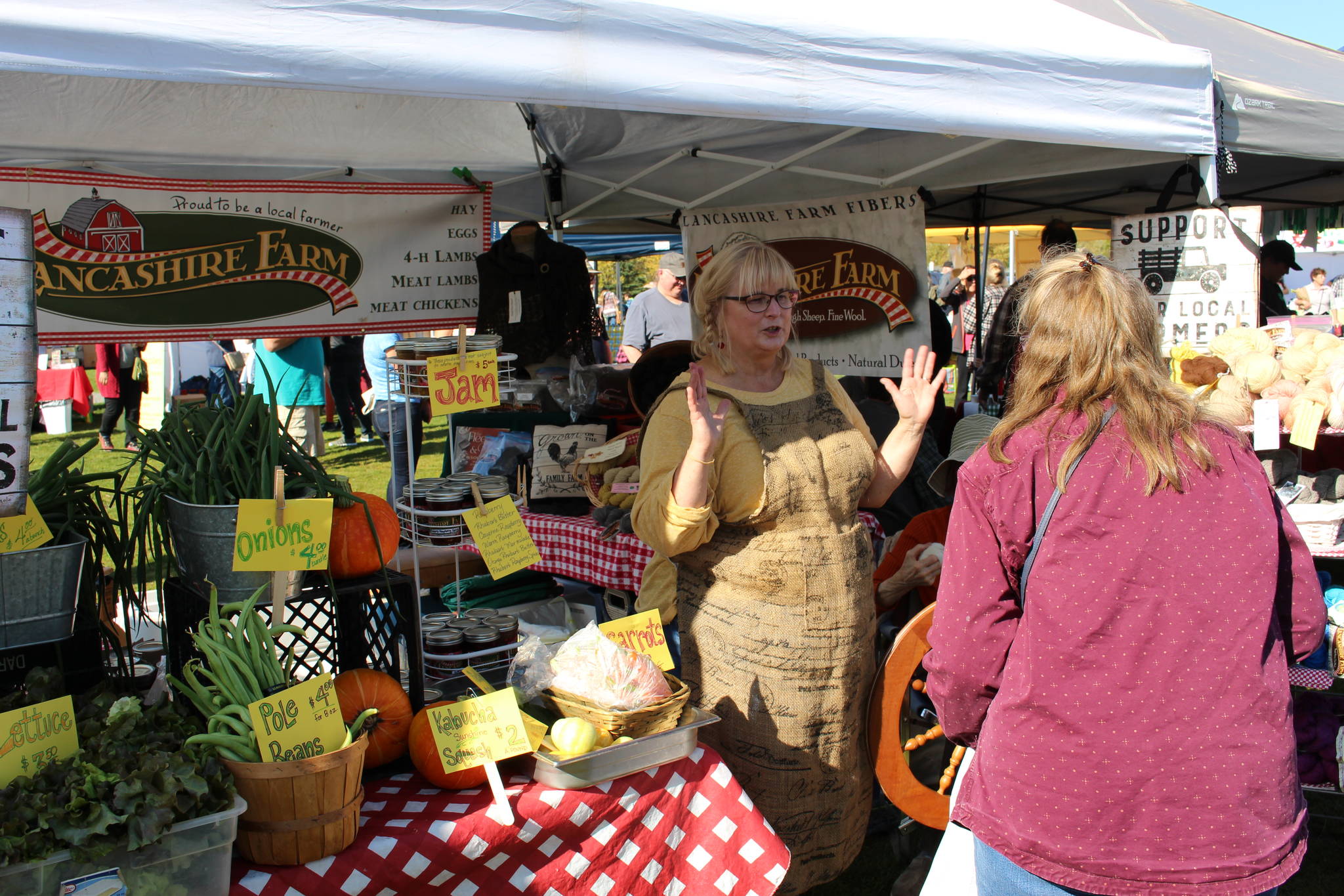 Jane Conway of Lancashire Farm shows off her products at the Harvest Moon Local Food Festival at Soldotna Creek Park on Sept. 14, 2019. (Photo by Brian Mazurek/Peninsula Clarion)