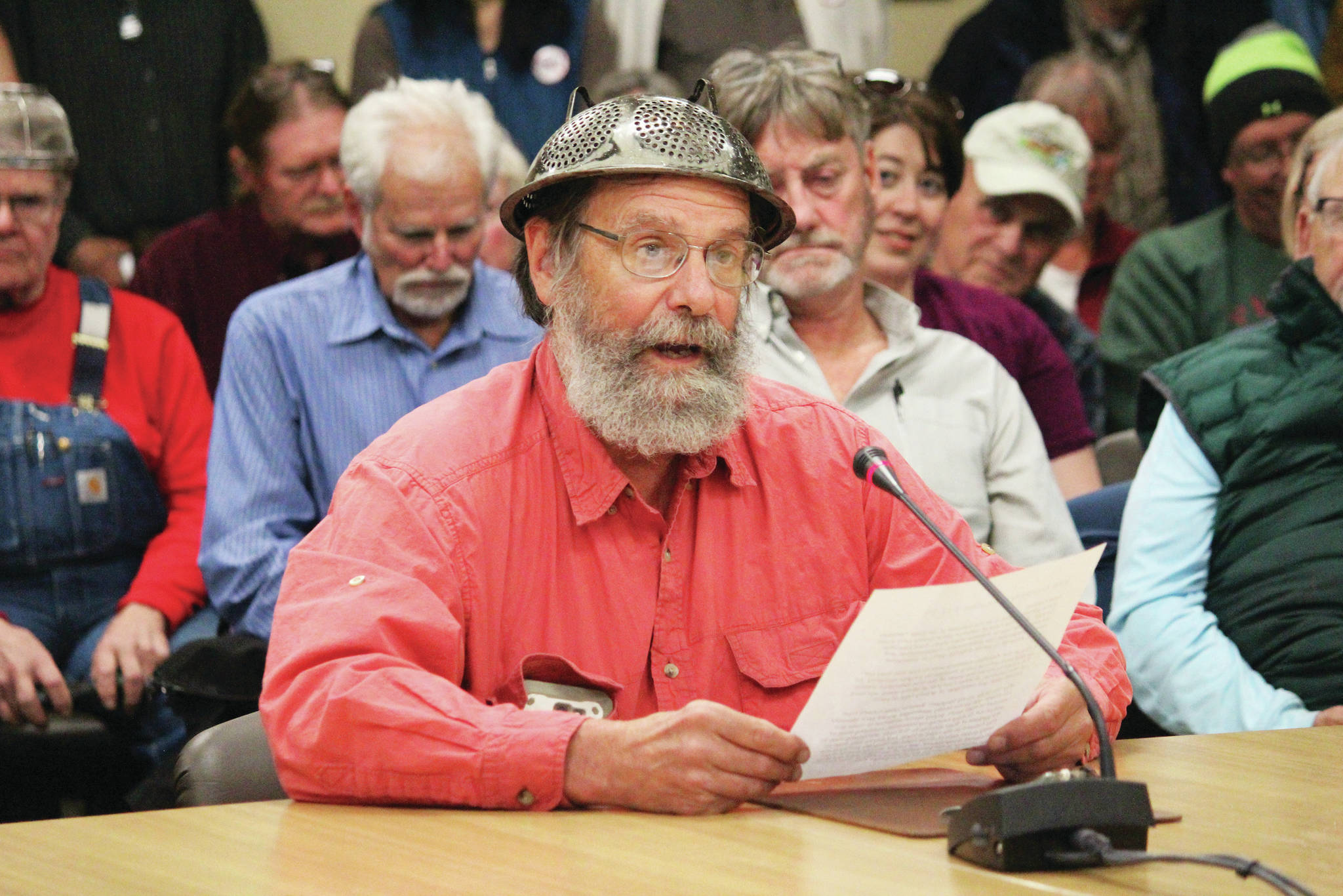 Megan Pacer/Homer News                                Frtiz Creek area resident Barrett Fletcher gives the invocation before a Tuesday Kenai Peninsula Borough Assembly meeting as a representative of the Church of the Flying Spaghetti Monster at Homer City Hall.
