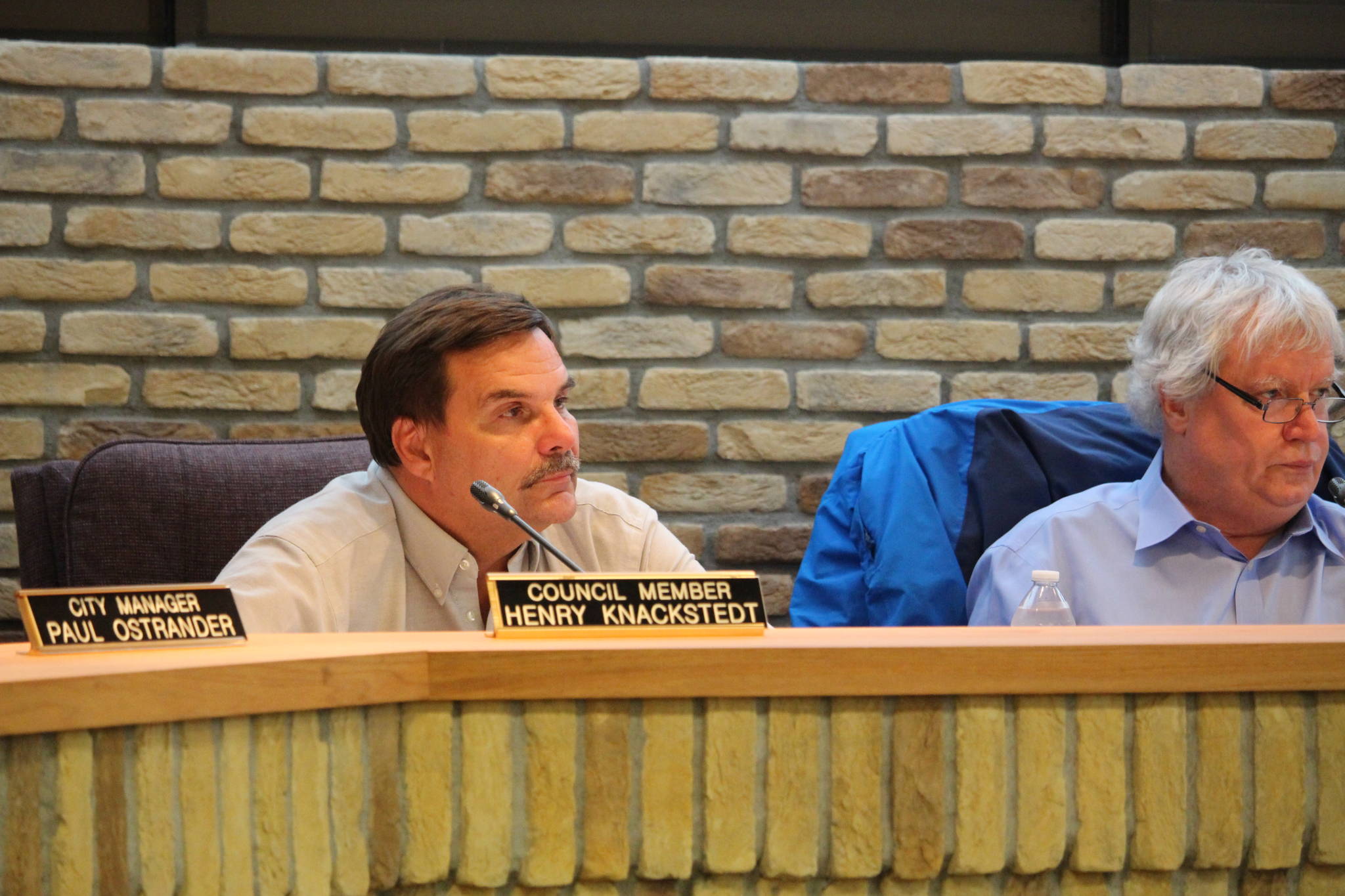 Kenai City Council Members Henry Knackstedt, left, and Bob Molloy, right, listen to public comments during the Kenai City Council Meeting on Wednesday, Sept. 18, 2019. (Photo by Brian Mazurek/Peninsula Clarion)