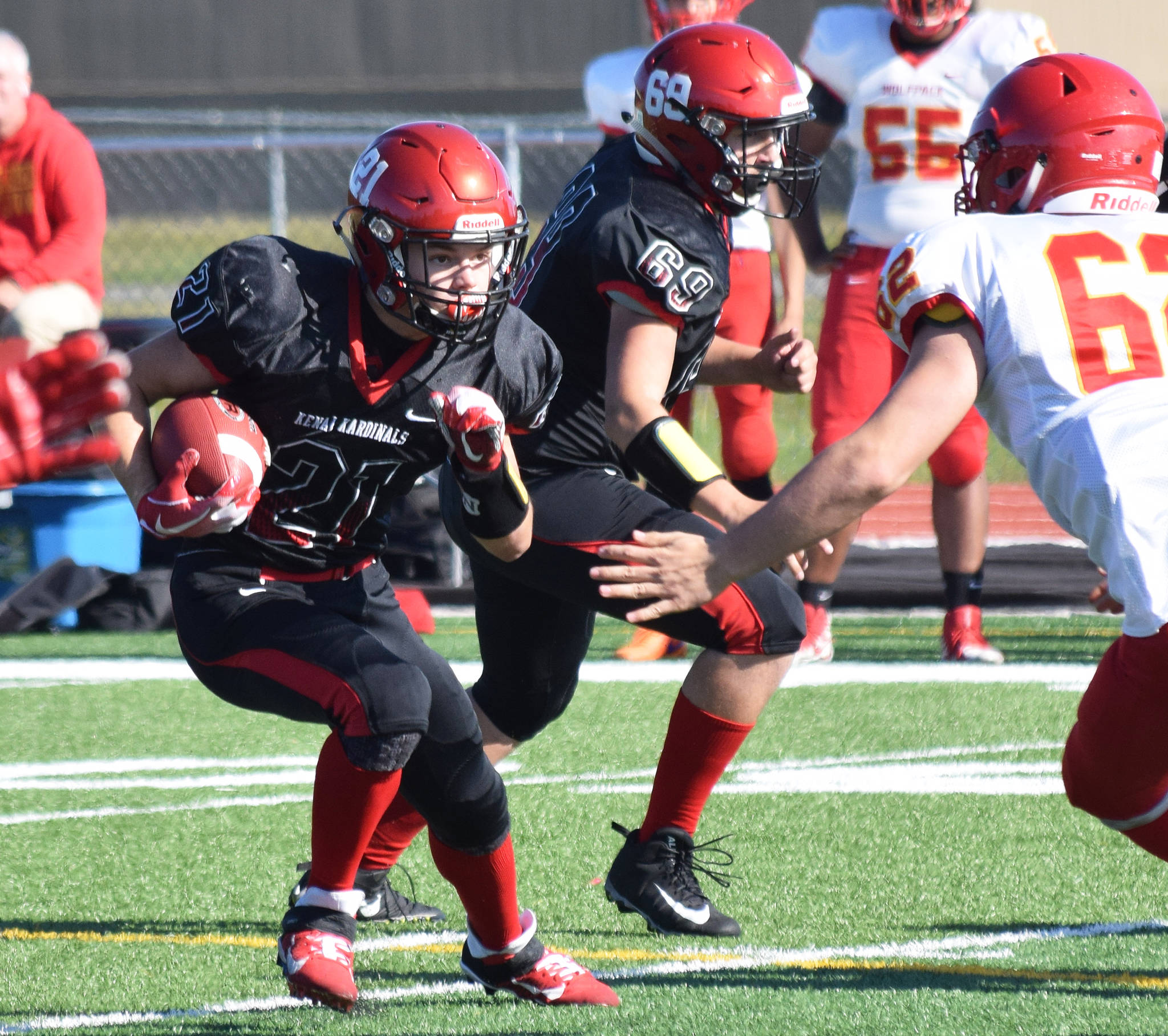 Kenai Central running back Zach Burnett looks for a gap Saturday, Sept. 14, 2019, against West Valley at Ed Hollier Field in Kenai, Alaska. (Photo by Joey Klecka/Peninsula Clarion)