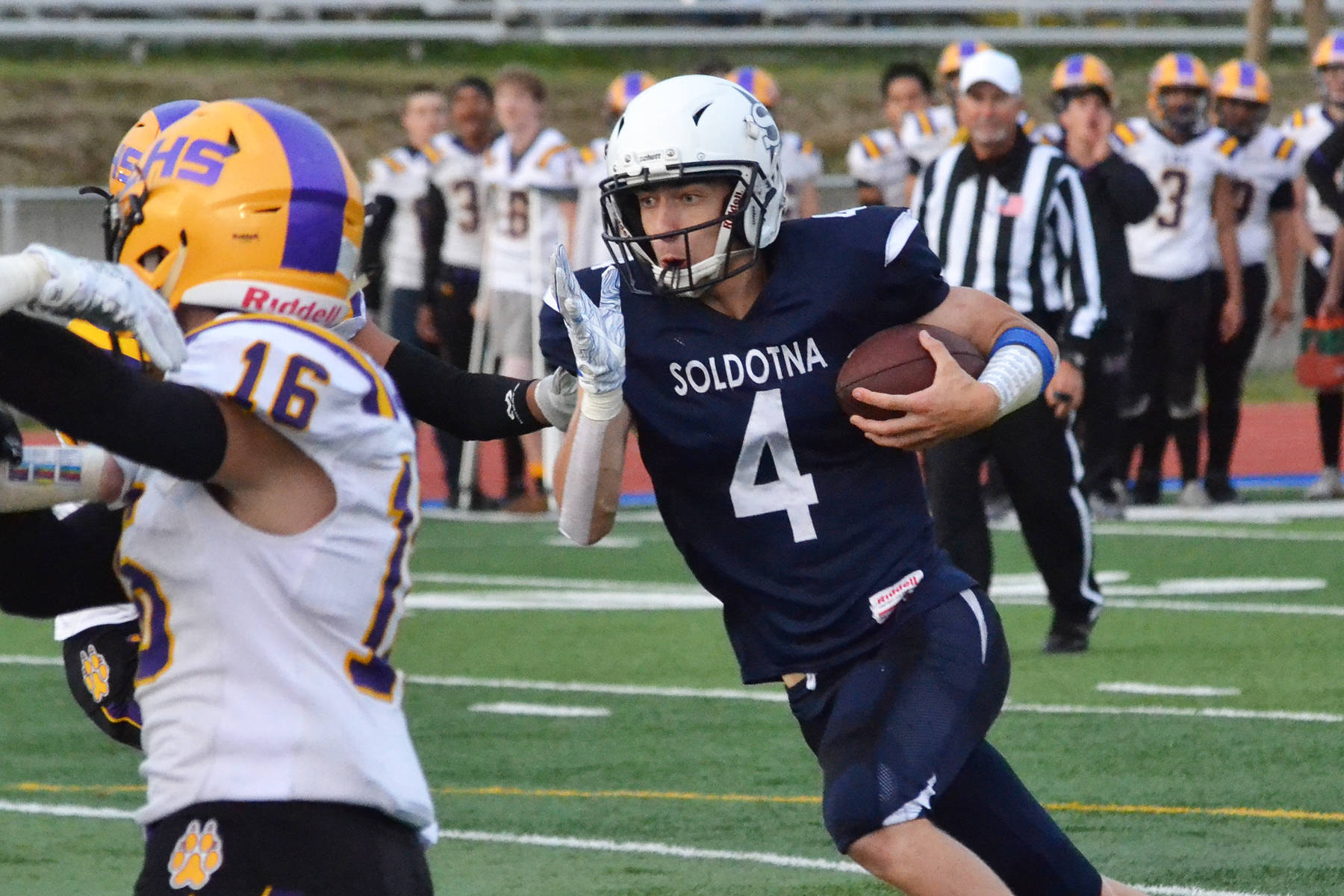 Soldotna quarterback Jersey Truesdell runs the ball against the Lathrop Malamutes Friday, Sept. 13, 2019, at Justin Maile Field in Soldotna. (Photo by Joey Klecka/Peninsula Clarion)