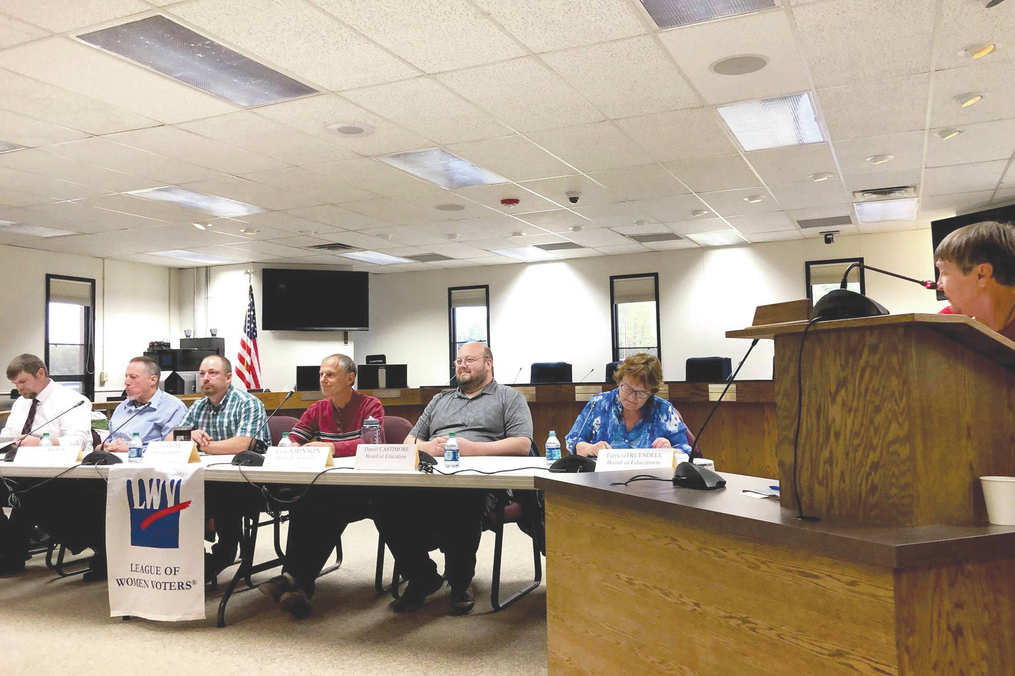 Victoria Petersen / Peninsula Clarion                                Sammy Crawford, a board member with the League of Women Voters, asks assembly and school board candidates questions at a forum held in on Thursday, Sept. 19 in Soldotna, ahead of the Oct. 1 municipal election.