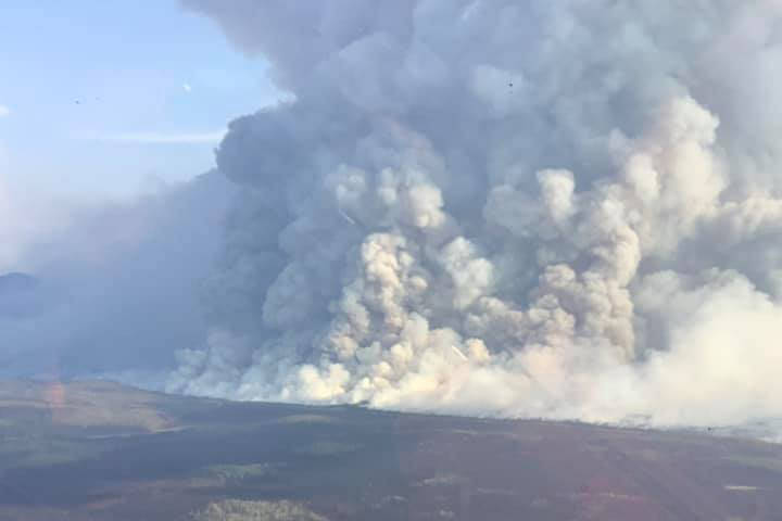 The Swan Lake Fire can be seen from above on Monday, Aug. 26, 2019, Kenai Peninsula, Alaska. (Photo courtesy Alaska Wildland Fire Information)