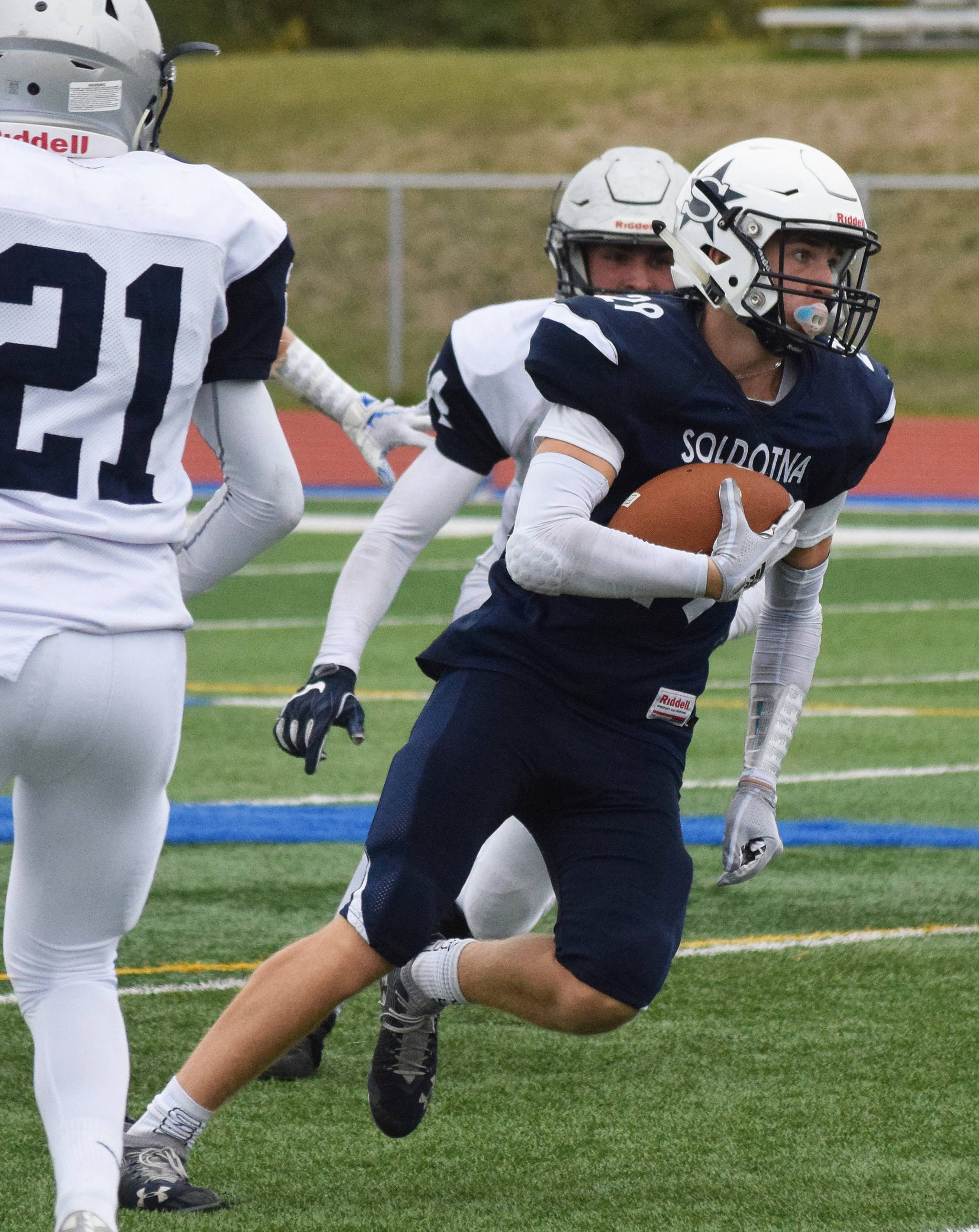 Soldotna’s Tyler Morrison runs the ball back after intercepting Eagle River quarterback Nathaniel Guderian, Saturday, Sept. 28, 2019, against Eagle River at Justin Maile Field in Soldotna. (Photo by Joey Klecka/Peninsula Clarion)