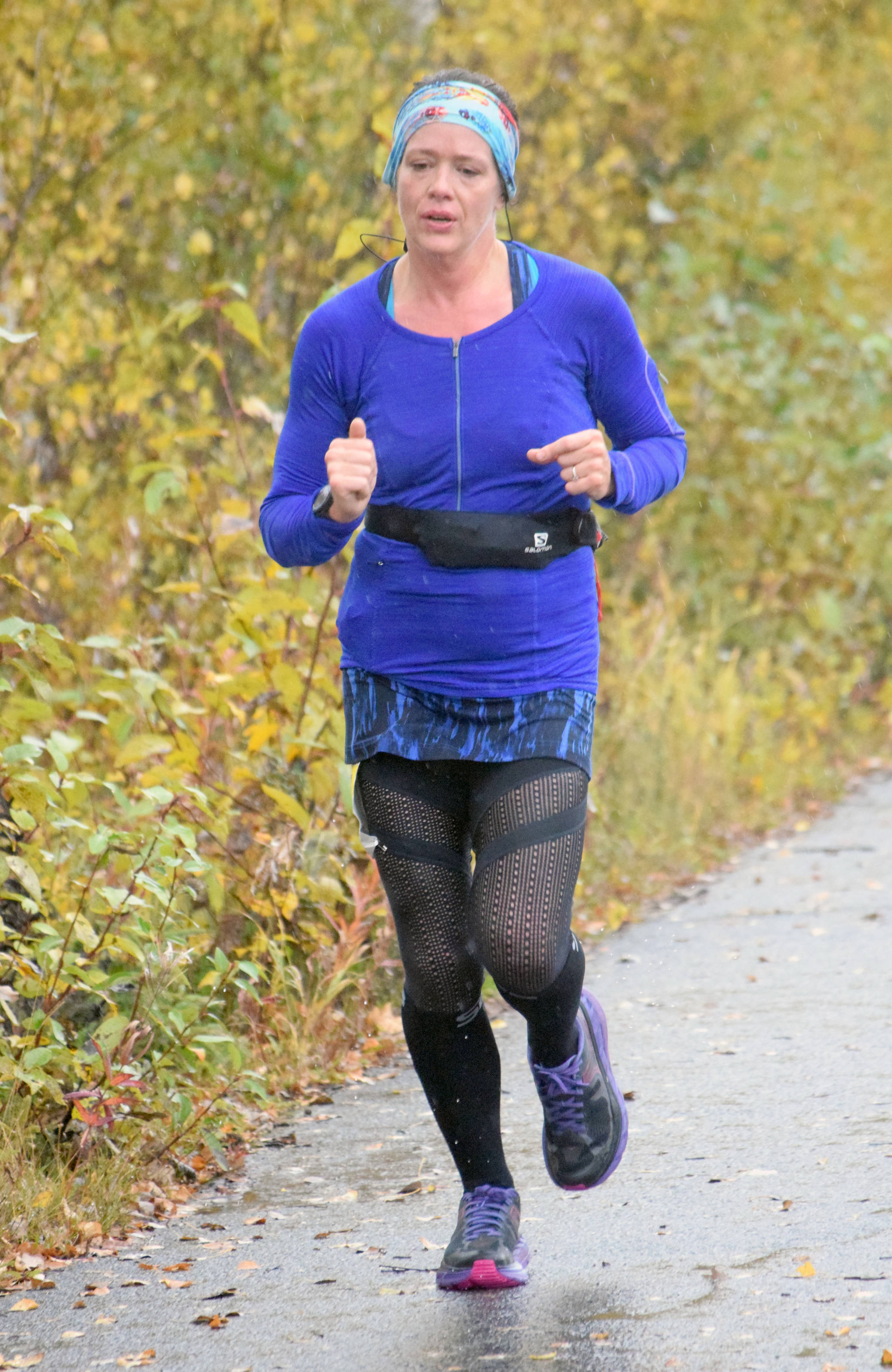 Kristen Buckwalter of Homer runs to victory in the Half Marathon at the Kenai River Marathon on Sunday, Sept. 29, 2019, in Alaska. (Photo by Jeff Helminiak/Peninsula Clarion)