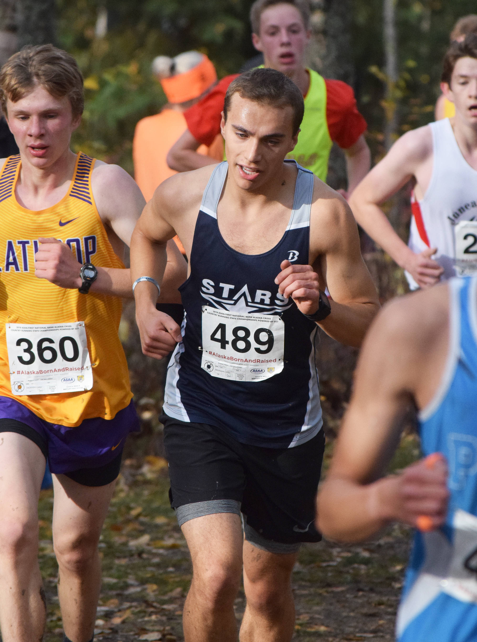 Soldotna’s Bradley Walters races midway through the Div. I boys state cross-country championships Saturday, Oct. 5, 2019, on the Bartlett High trails in Anchorage, Alaska. (Photo by Joey Klecka/Peninsula Clarion)