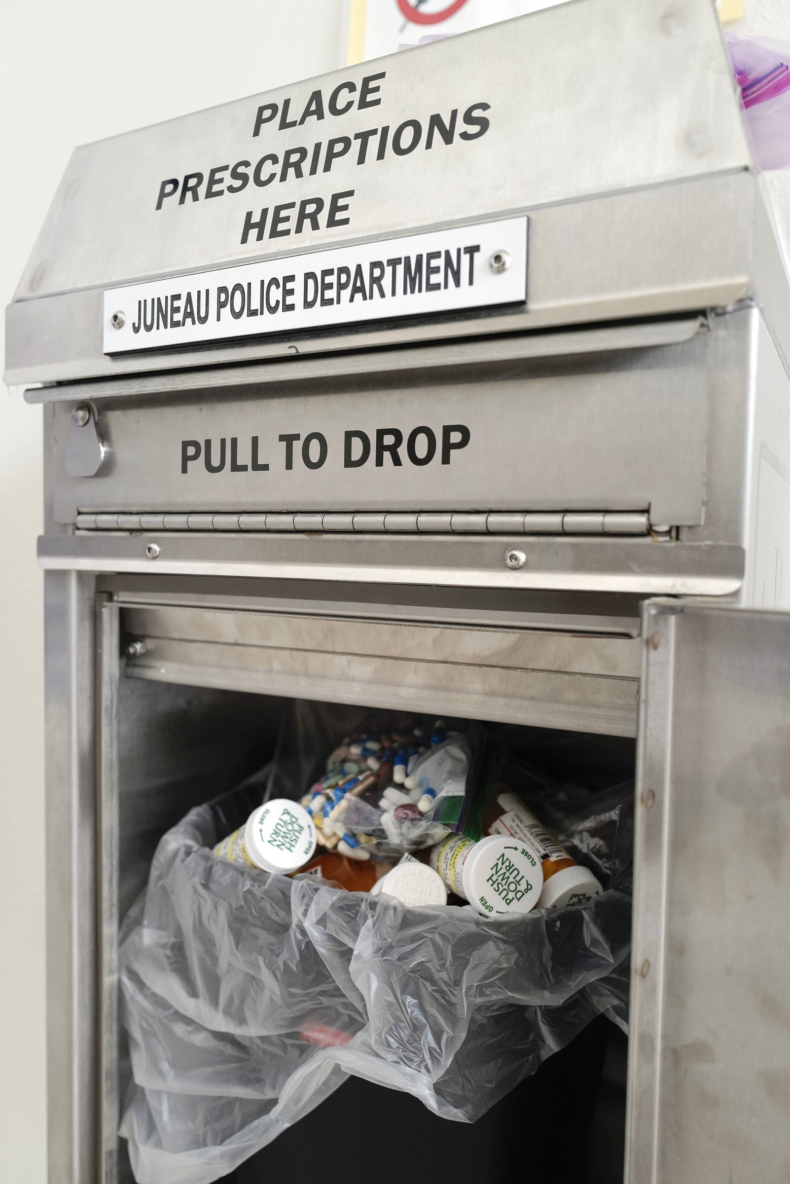 A drug drop box in the lobby of the Juneau Police Department gives residents a safe place to disposed of their unused prescription narcotics. (Michael Penn | Juneau Empire)
