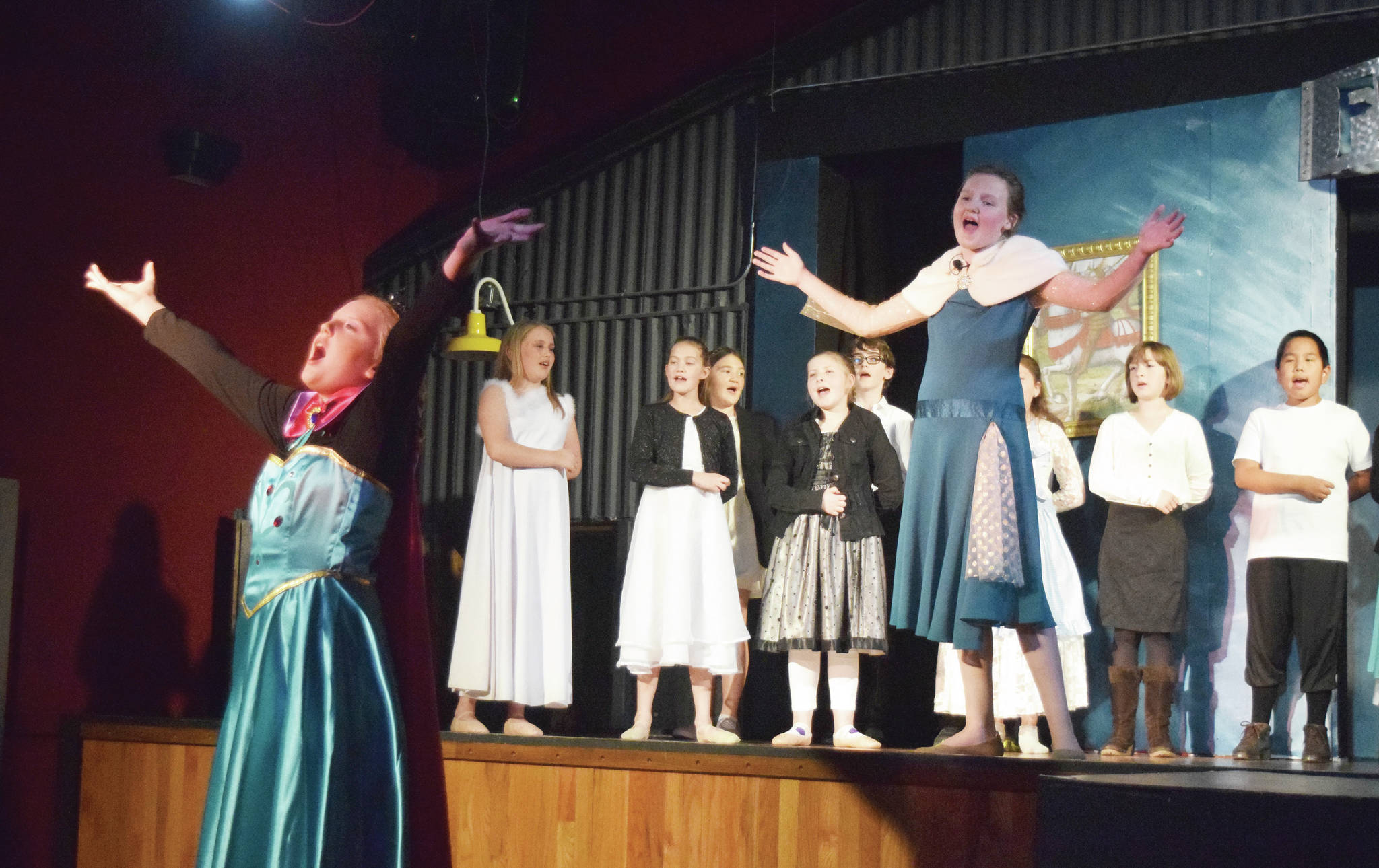 Joey Klecka / Peninsula Clarion                                 The youth cast of “Frozen Jr.” rehearses a scene Wednesday at the Triumvirate North theater in Kenai.