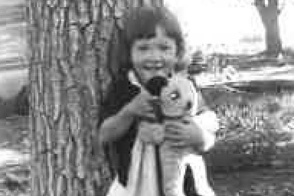 Grannie Annie’s sister, Ginger, can be seen holding her teddybear in this photo taken in June, 1945. (Photo courtesy Ann Berg)