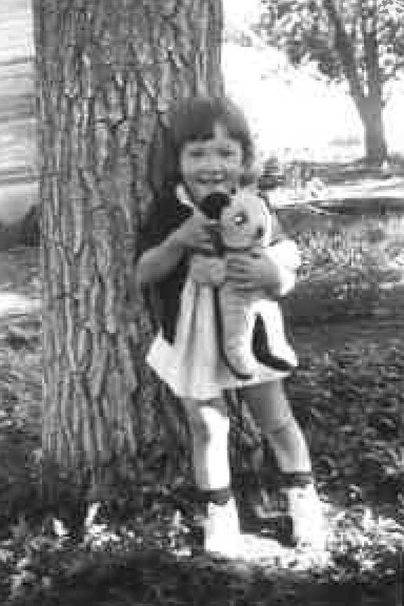 Photo courtesy Ann Berg                                Grannie Annie’s sister, Ginger, can be seen holding her teddy bear in this photo taken in June, 1945.