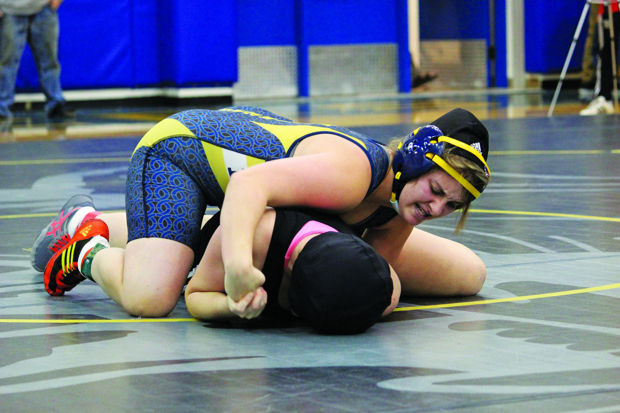 Homer’s Mischelle tries to flip Nikiski’s Tawnisha Freeman over during the Best Western Bidarka Round Robin Rumble wrestling tournament Saturday, Oct. 19, 2019 in the Alice Witte Gymnasium in Homer, Alaska. (Photo by Megan Pacer/Homer News)