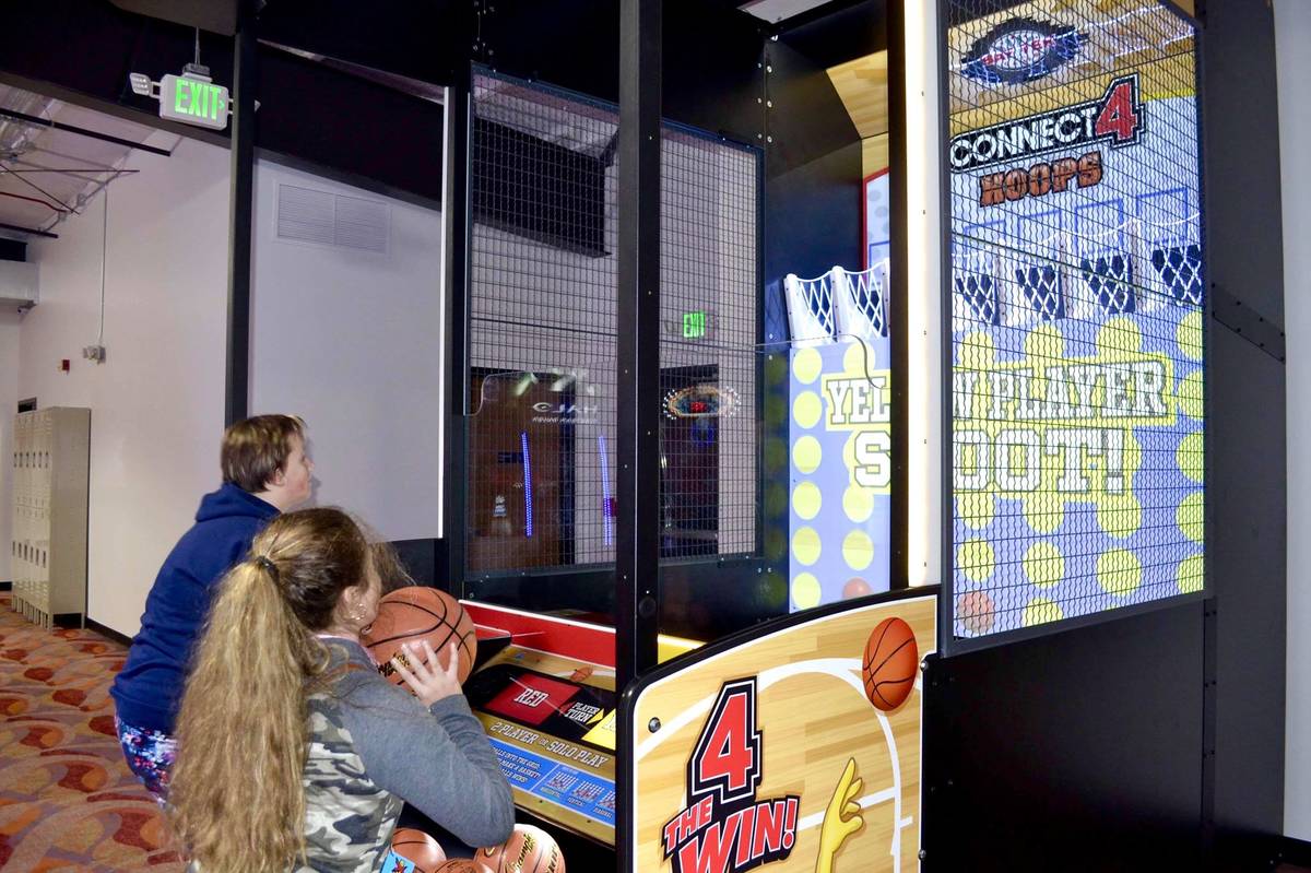 Victoria Petersen / Peninsula Clarion                                Children shoot hoops Wednesday in the newly opened Kenai Extreme Fun Center in Kenai.