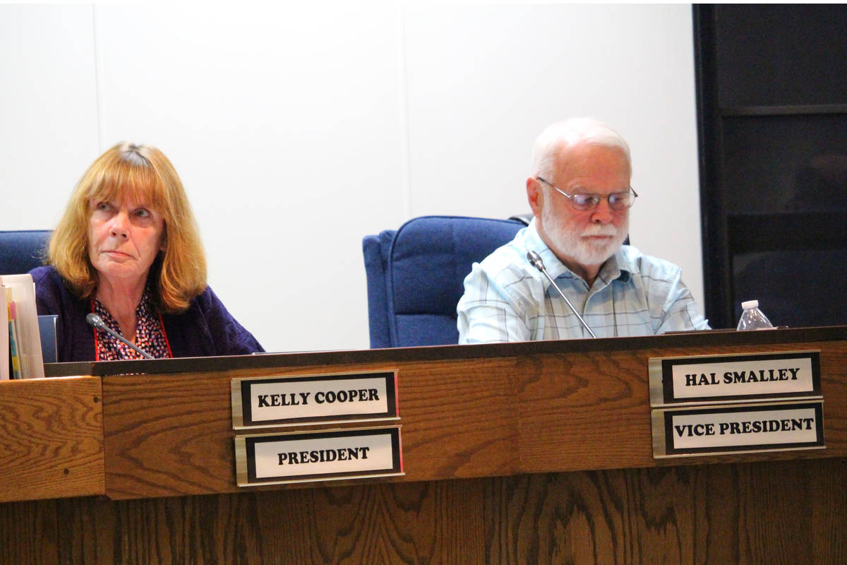 Brian Mazurek / Peninsula Clarion                                Kenai Peninsula Borough Assembly President Kelly Cooper and Vice President Hal Smalley attend the assembly meeting Tuesday in Soldotna.