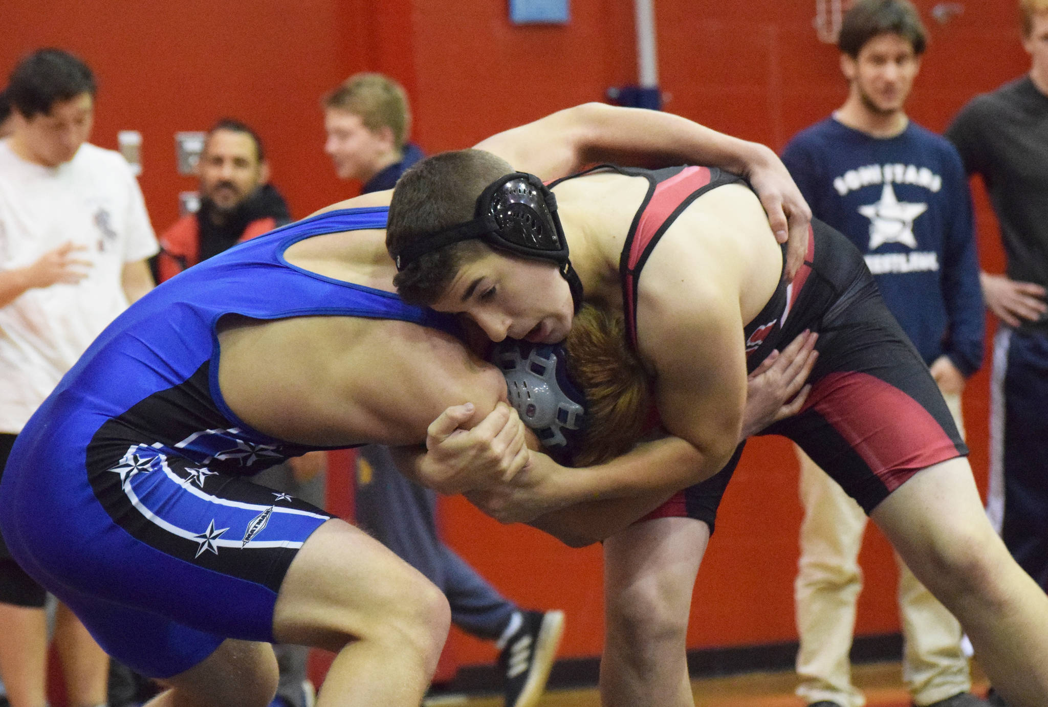 Kenai’s Zach Halstead grapples with Soldotna’s Josh Hall, Saturday, Oct 26, 2019, at the Luke Spruill Memorial Tournament at Kenai Central High School in Kenai, Alaska. (Photo by Joey Klecka/Peninsula Clarion)