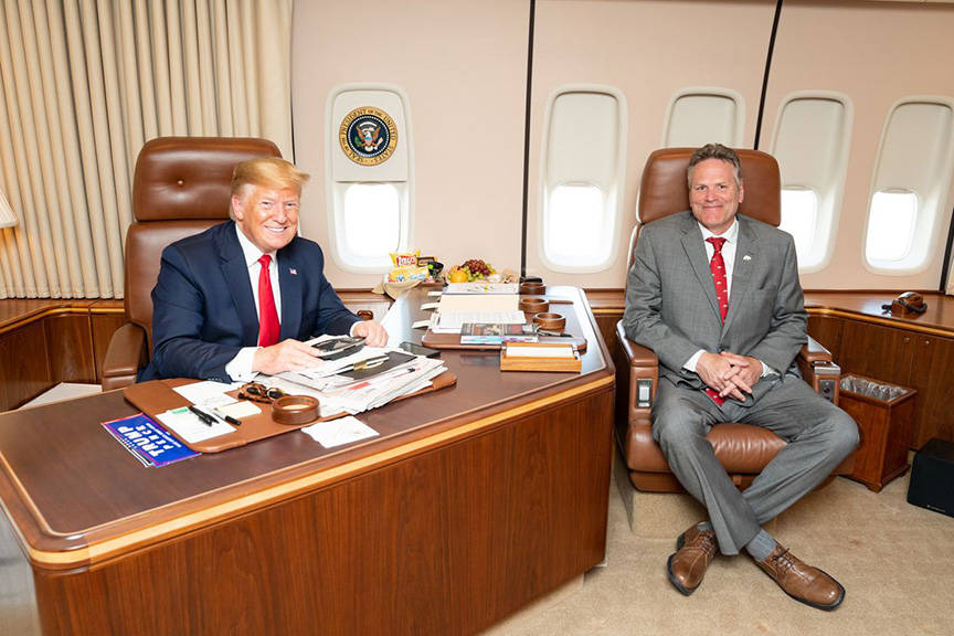 Gov. Mike Dunleavy with President Donald Trump aboard Air Force One in June. (Courtesy photo | White House photographer)