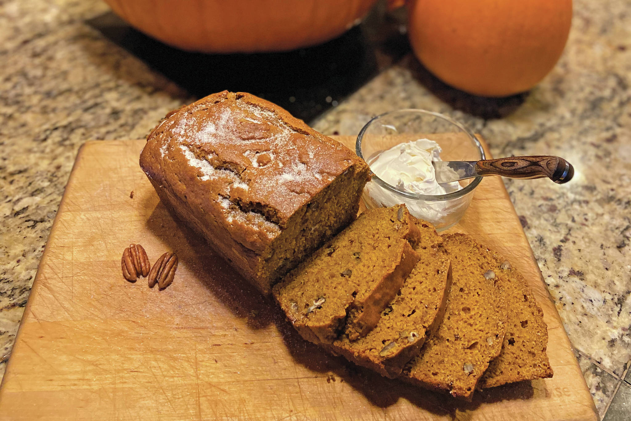 A little bit of pumpkin butter is the perfect complement to Teri Robl’s pumpkin bread, as in here in her kitchen on Oct. 29, 2019, in Homer, Alaska. (Photo by Teri Robl)