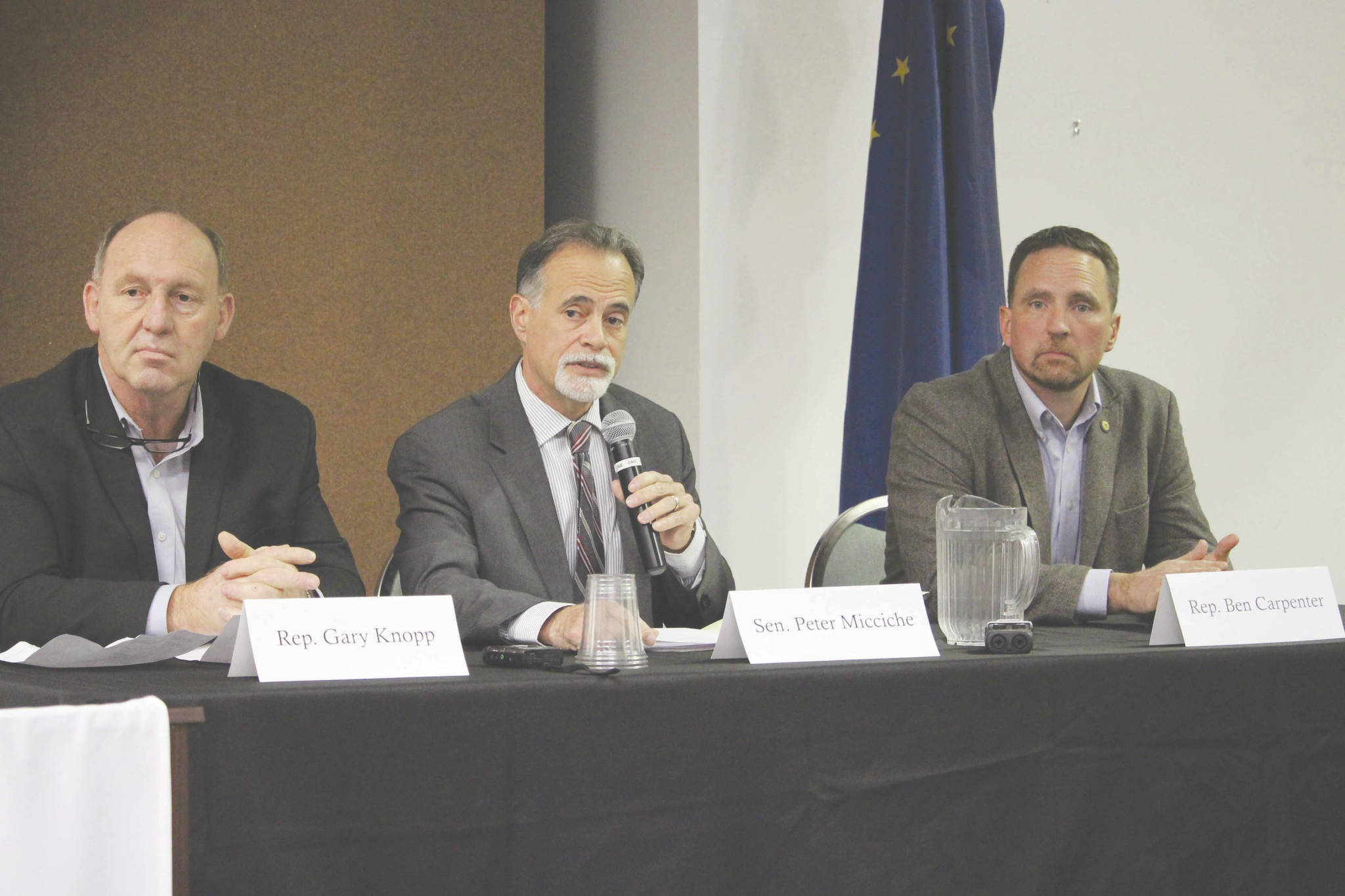 Brian Mazurek / Peninsula Clarion                                Rep. Gary Knopp, R-Soldotna, Sen. Peter Micciche, R- Soldotna, and Rep. Ben Carpenter, R-Nikiski, speak to members of the Kenai and Soldotna Chambers of Commerce at the Kenai Visitor and Cultural Center on Wednesday.