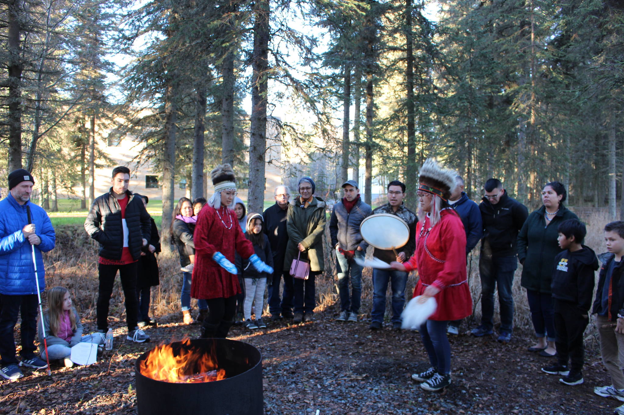 Members of the Kahtnu Yurartet dance group perform a traditional Yupik dance during a ceremony celebrating the life Dr. Alan Boraas at Kenai Peninsula College on Nov. 9, 2019. (Photo by Brian Mazurek/Peninsula Clarion)