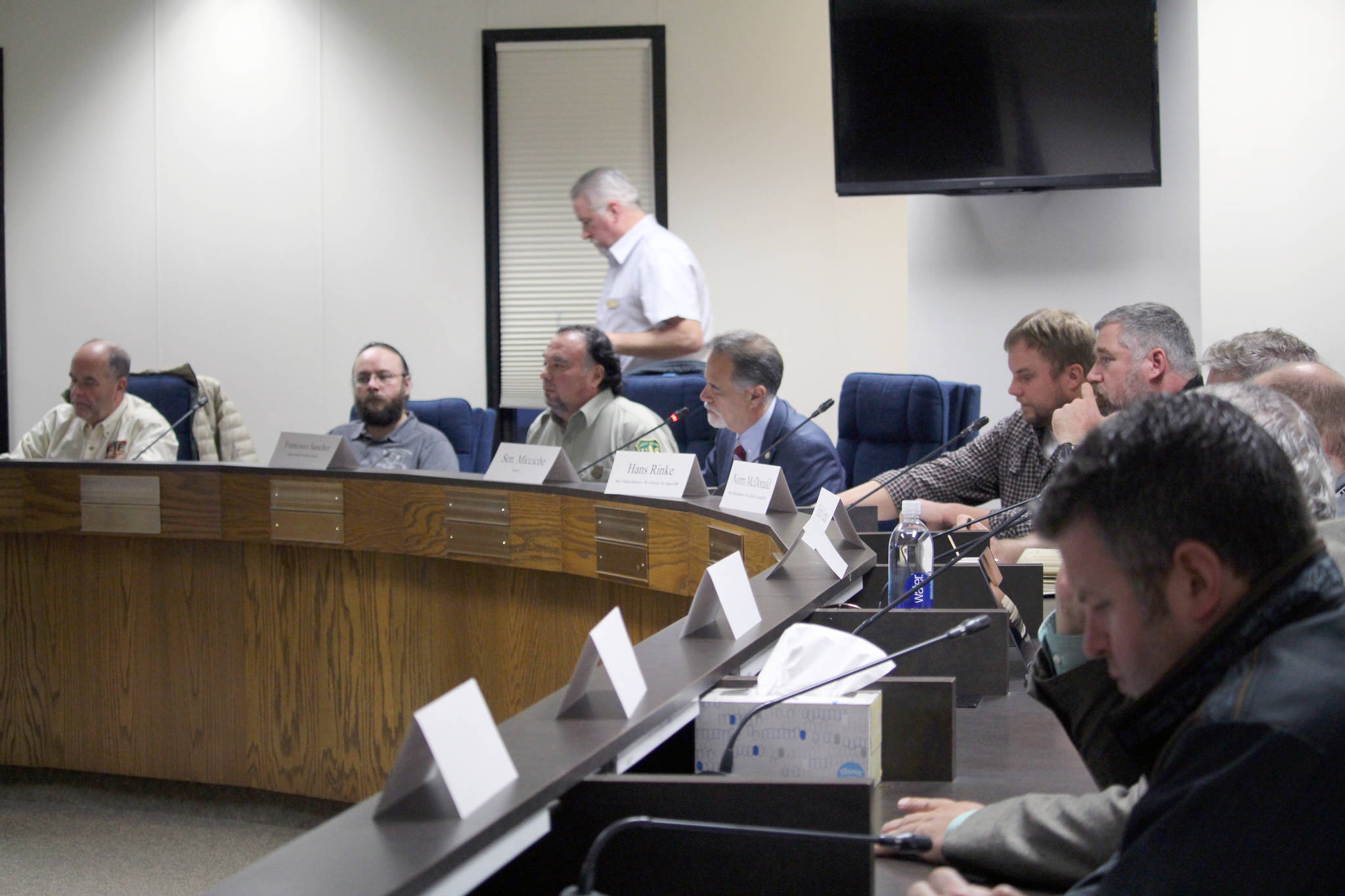 Representatives from local, state and federal agencies participate in a discussion about the Swan Lake Fire at the Kenai Peninsula Borough Assembly Chambers in Soldotna, Alaska on Nov. 13, 2019. (Photo by Brian Mazurek/Peninsula Clarion)