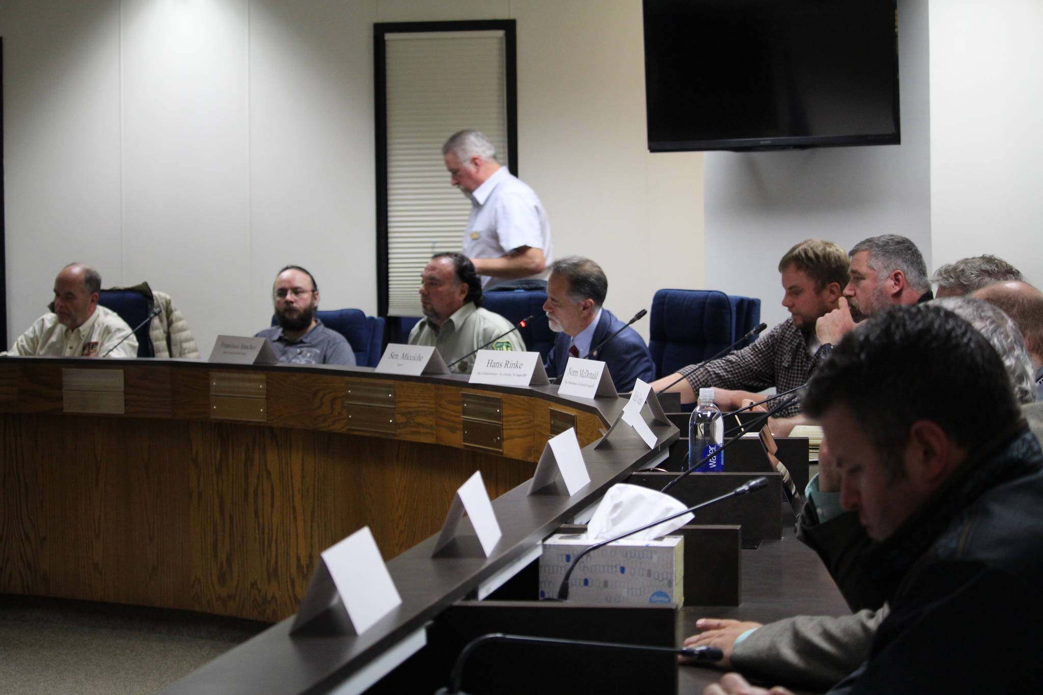 Representatives from local, state and federal agencies participate in a discussion about the Swan Lake Fire at the Kenai Peninsula Borough Assembly Chambers in Soldotna, Alaska on Nov. 13, 2019. (Photo by Brian Mazurek/Peninsula Clarion)