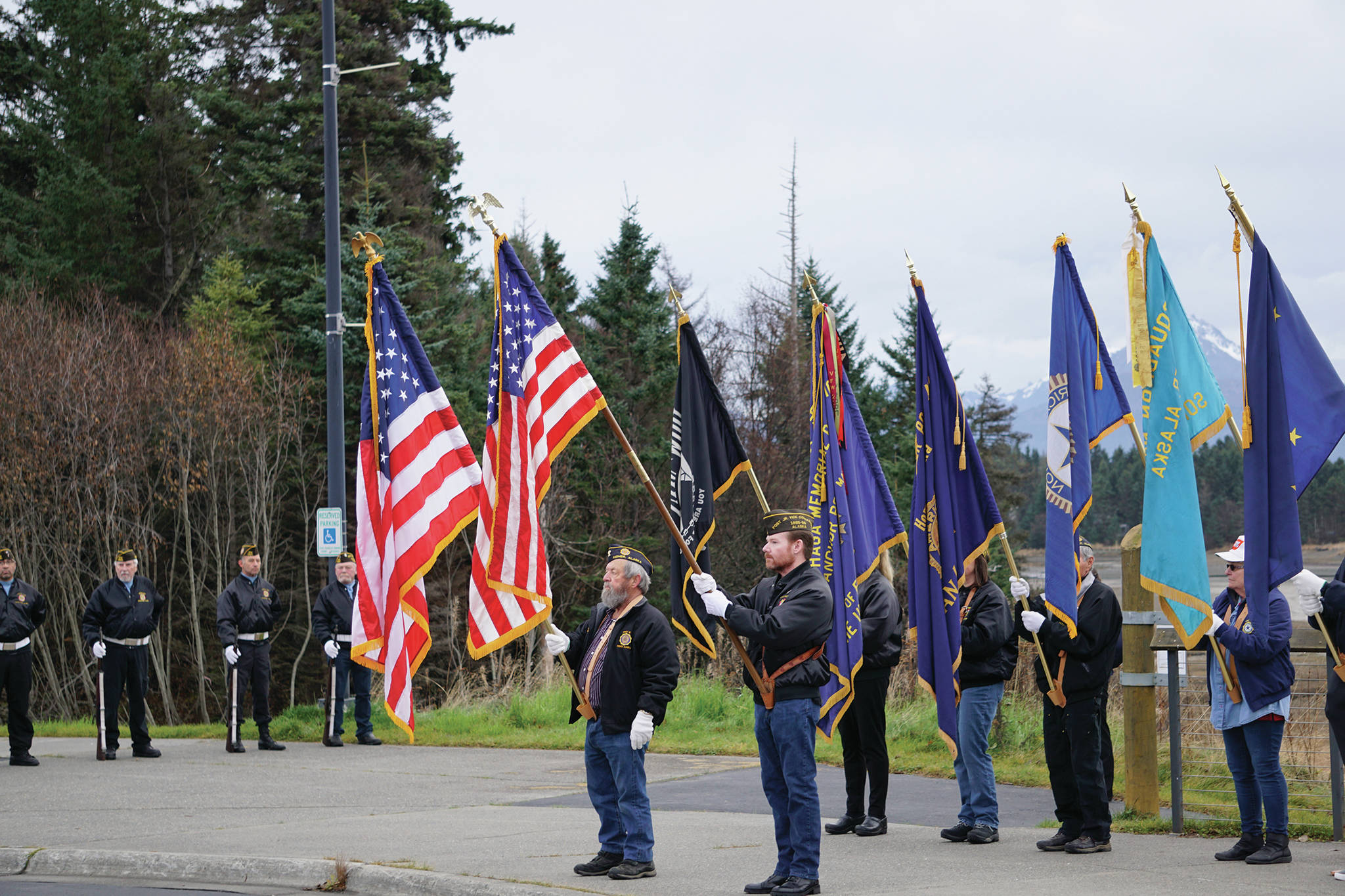 Members of the Veterans of Foreign Wars, Anchor Point Post, the American Legion Post 16 and the Sons of the American Legion Post 16 participate in Veterans Day ceremonies on Nov. 11, 2019, at the Alaska Islands and Ocean Visitor Center. (Photo by Michael Armstrong / Homer News)