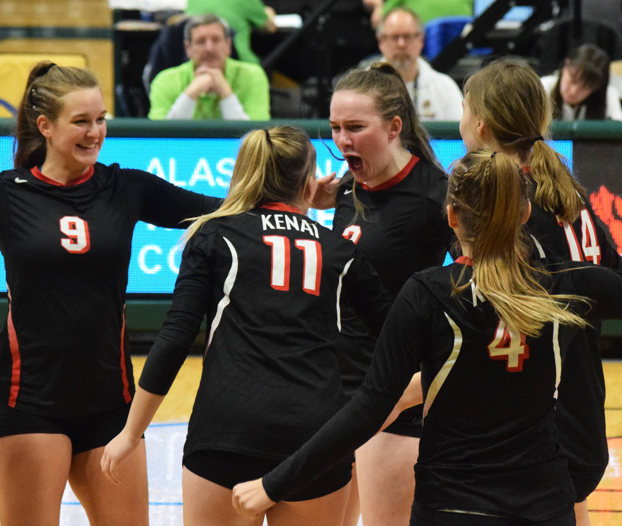 Kenai’s Bethany Morris gets her teammates fired up Friday, Nov. 15, 2019, against Nikiski at the Class 3A state volleyball tournament at the Alaska Airlines Center in Anchorage, Alaska. (Photo by Joey Klecka/Peninsula Clarion)