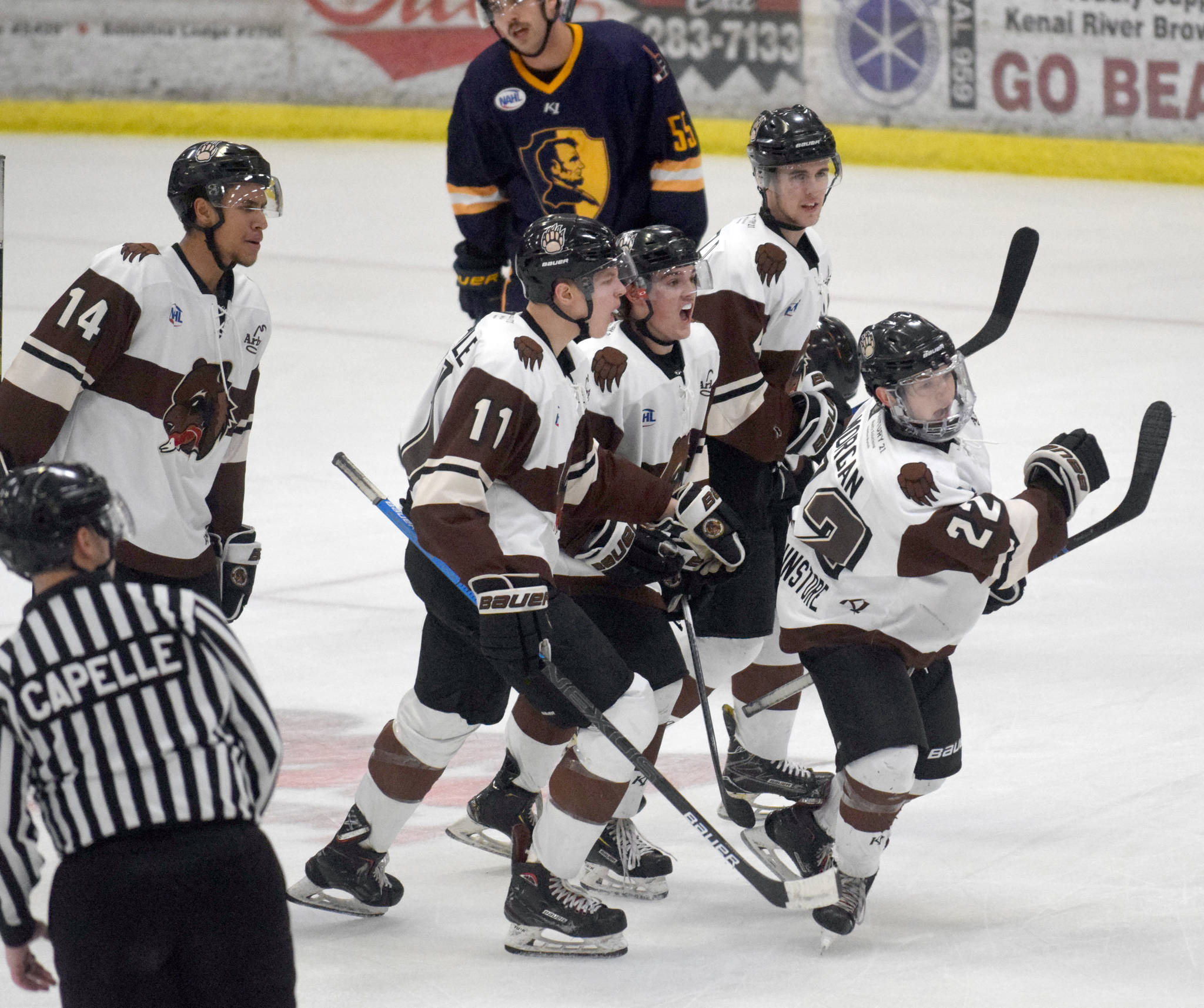 Peter Morgan of the Kenai River Brown Bears celebrates his goal with teammates Ryan Reid, Porter Schachle, Cody Moline and Dylan Hadfield on Friday, Nov. 15, 2019, against the Springfield (Illinois) Jr. Blues at the Soldotna Regional Sports Complex in Soldotna, Alaska. (Photo by Jeff Helminiak/Peninsula Clarion)