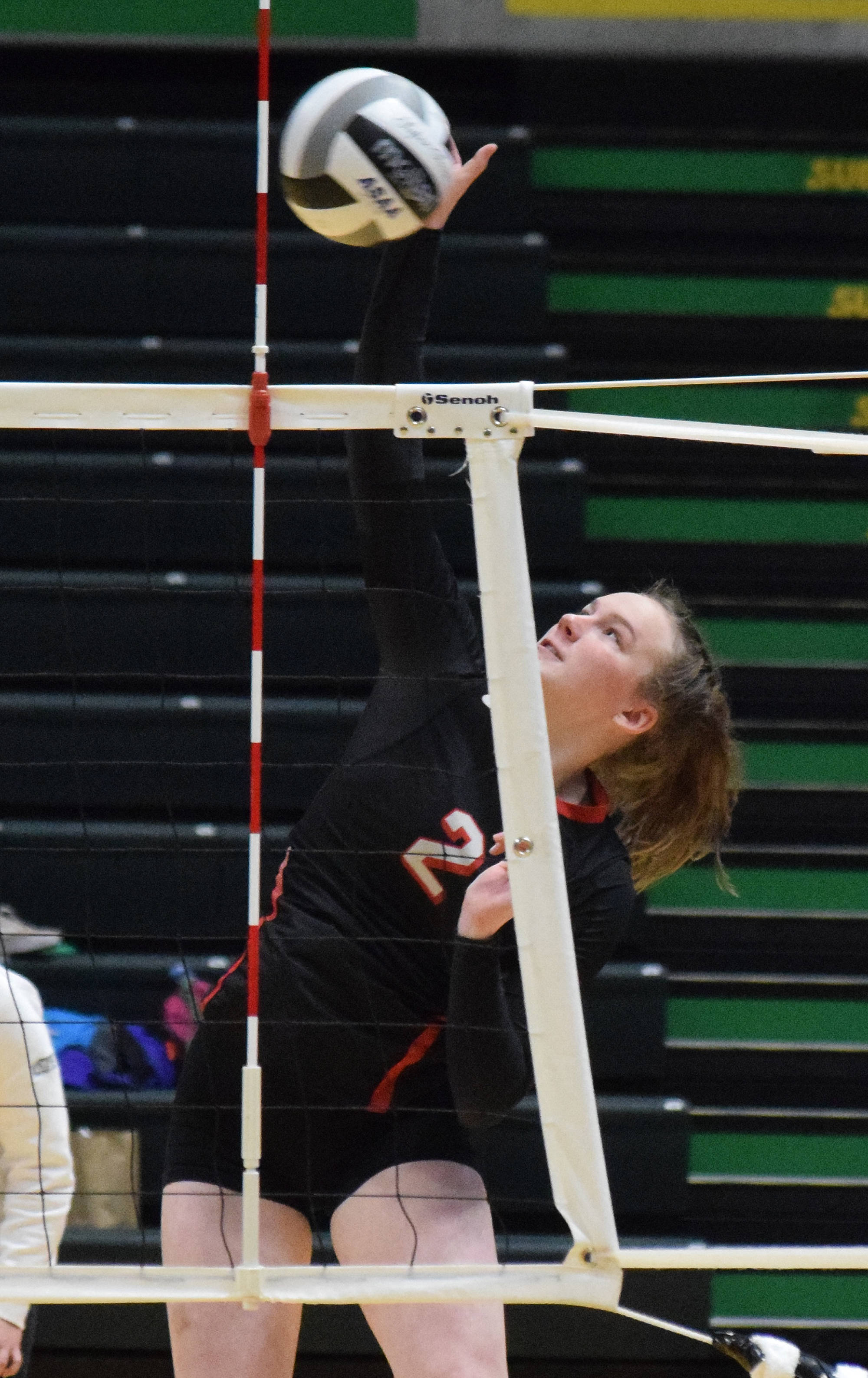 Kenai’s Bethany Morris puts up a shot Saturday, Nov. 16, 2019, against Homer at the Class 3A state volleyball tournament at the Alaska Airlines Center in Anchorage, Alaska. (Photo by Joey Klecka/Peninsula Clarion)