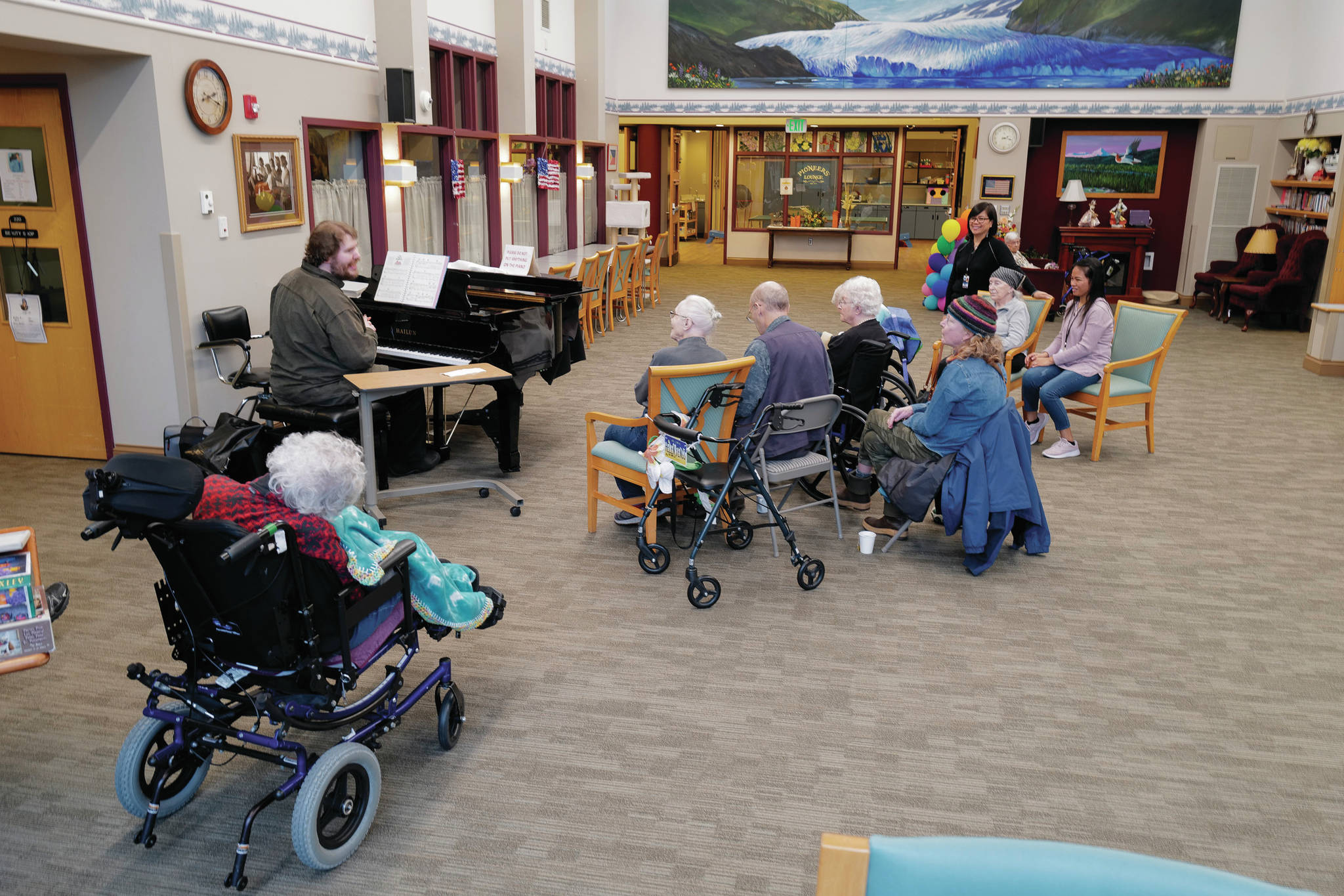 Michael Penn / Juneau Empire                                 Volunteer Victor Carlisle sings and plays the piano for Juneau Pioneer Home residents on Friday.