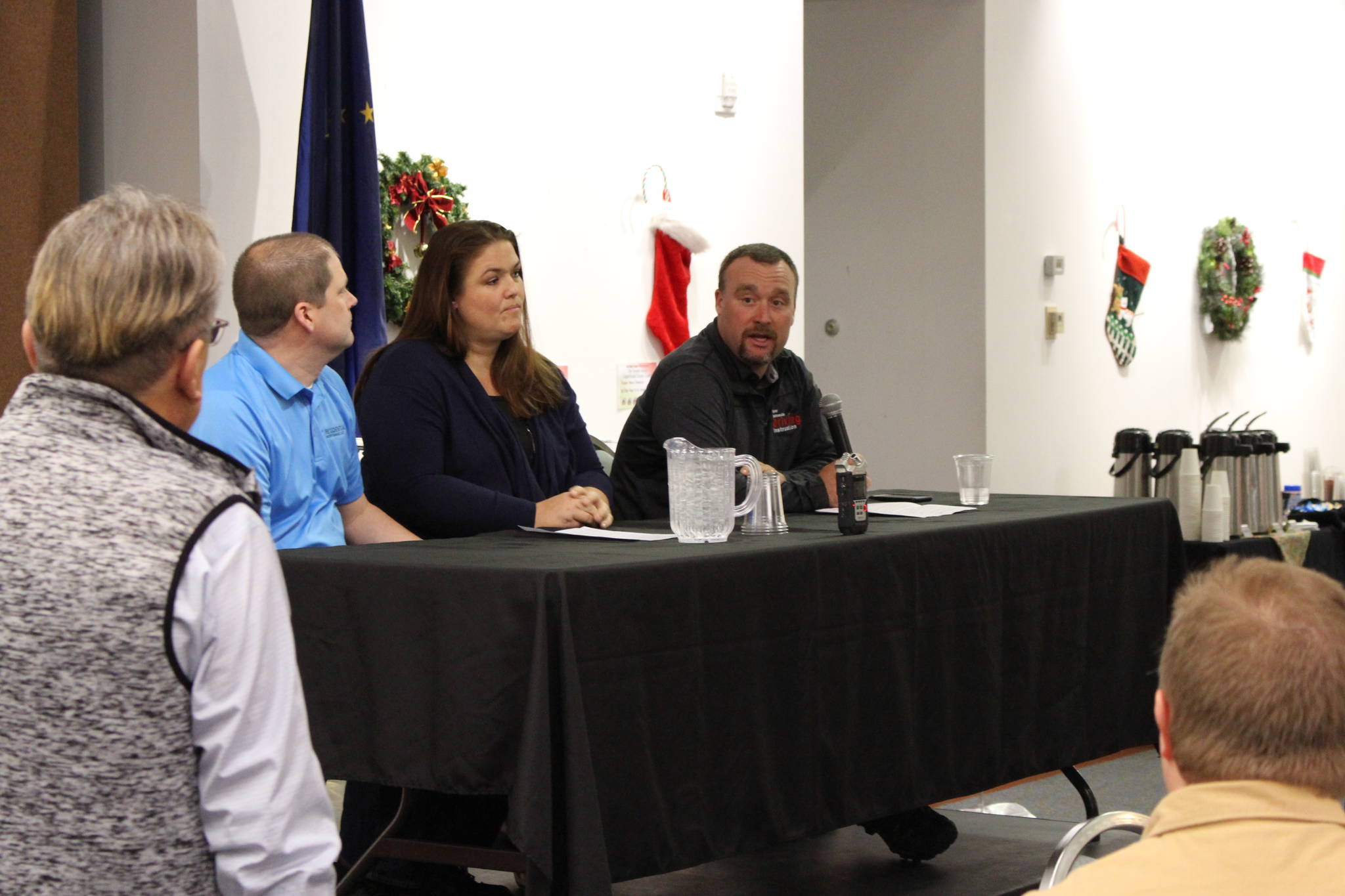 Local business owners Aaron Swanson, Darcy Swanson and Alex Douthit discuss their experiences as entrepreneurs in the community during the Kenai and Soldotna Chambers of Commerce Luncheon at the Kenai Visitor and Cultural Center on Nov. 20, 2019. (Photo by Brian Mazurek/Peninsula Clarion)