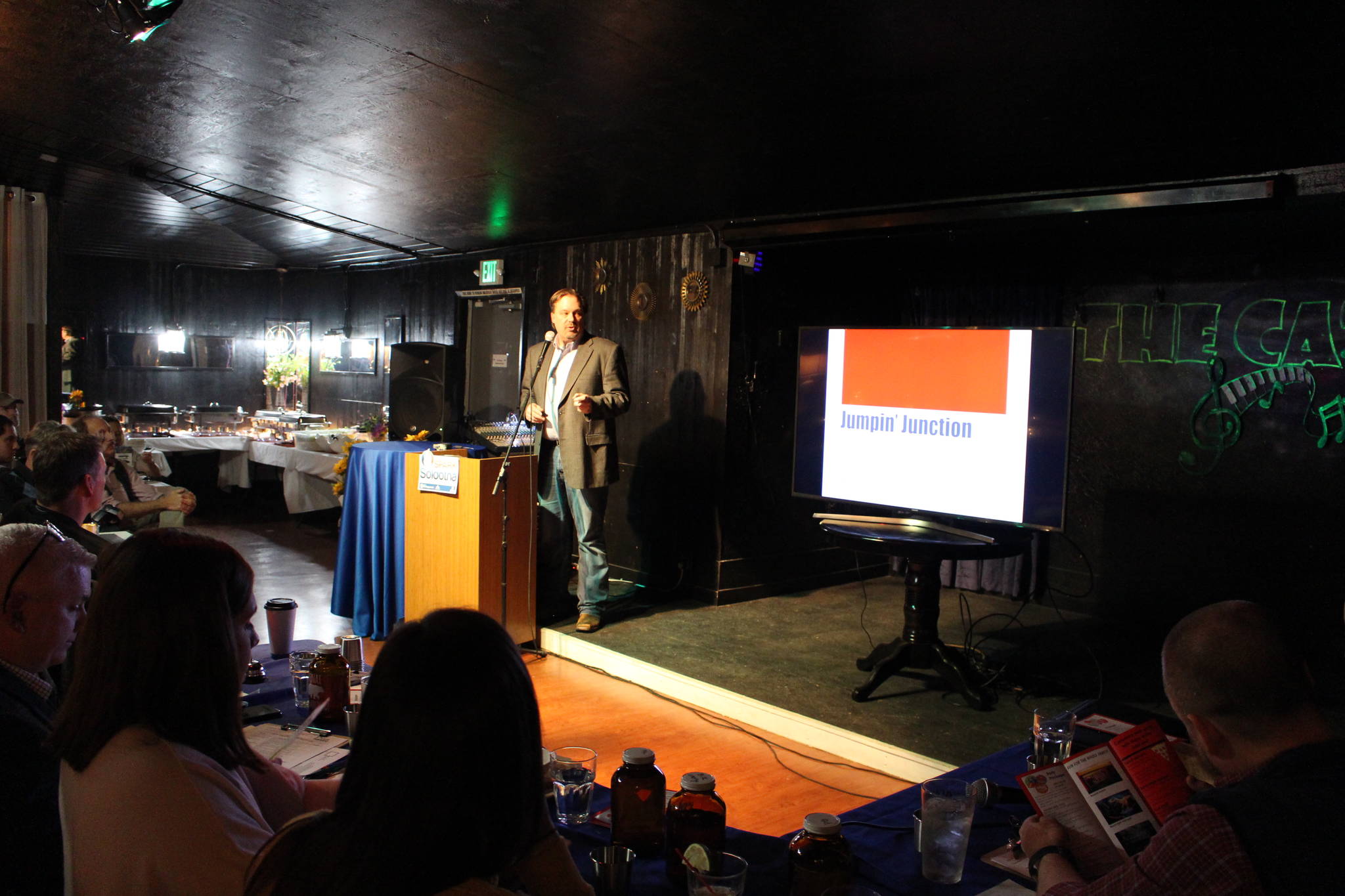 Kevin Miller, owner of Jumpin’ Junction Family Fun Center, gives his presentation to a panel of judges during the Spark Soldotna competition at the Catch Restaurant in Soldotna, Alaska, on Friday, Nov. 22, 2019. (Photo by Brian Mazurek/Peninsula Clarion)
