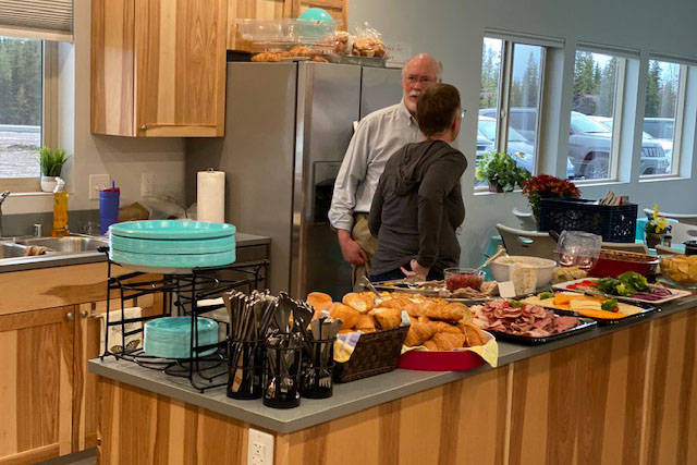 Residents of the Kenai Intentional Neighborhood celebrate the completion of their clubhouse with friends, family and Hope Community Resources board members in Soldotna, Alaska on Nov. 22, 2019. (Photo courtesy Kathy Fitzgerald)