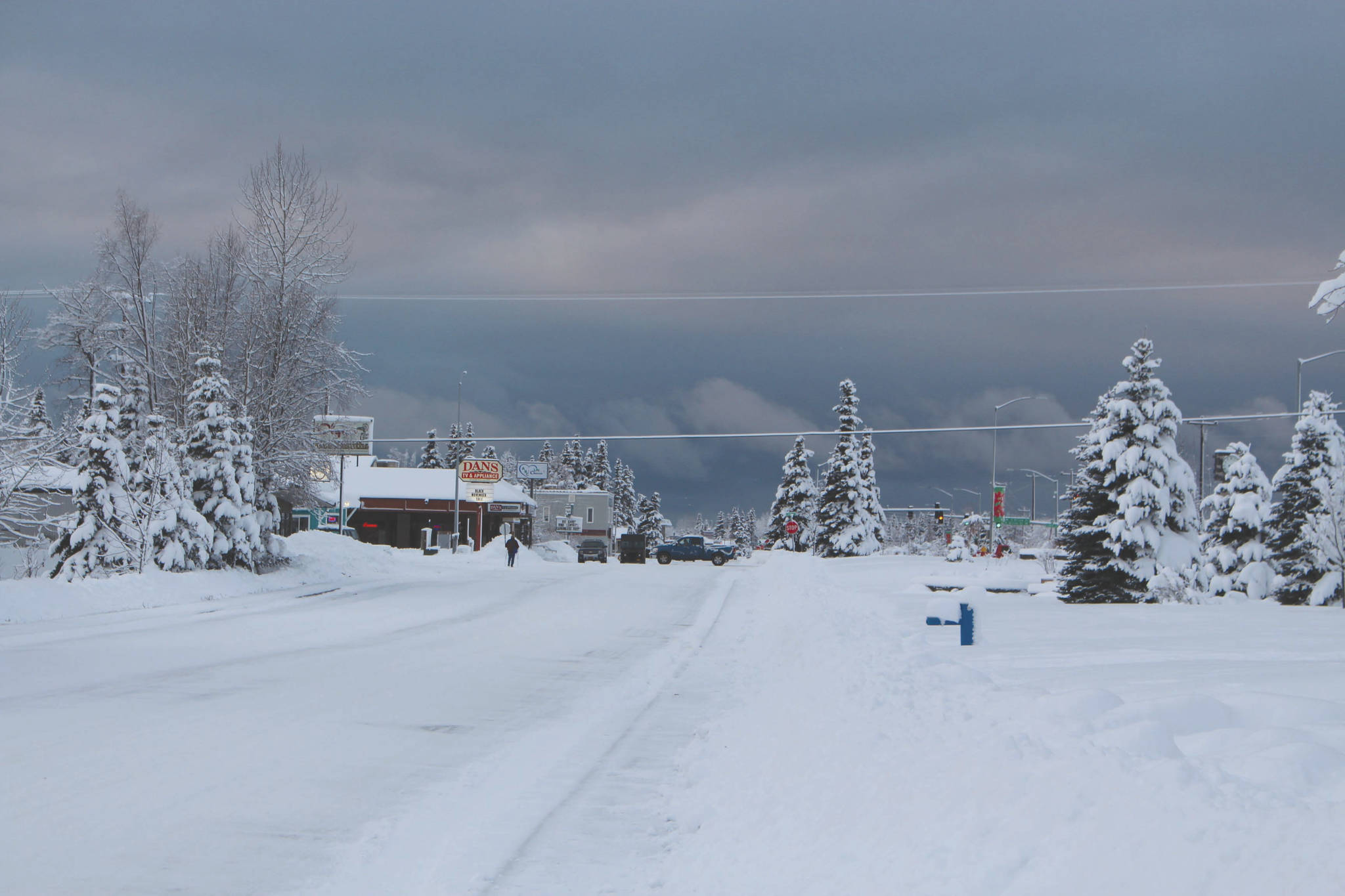 Frontage Road in Kenai is covered in compact snow.