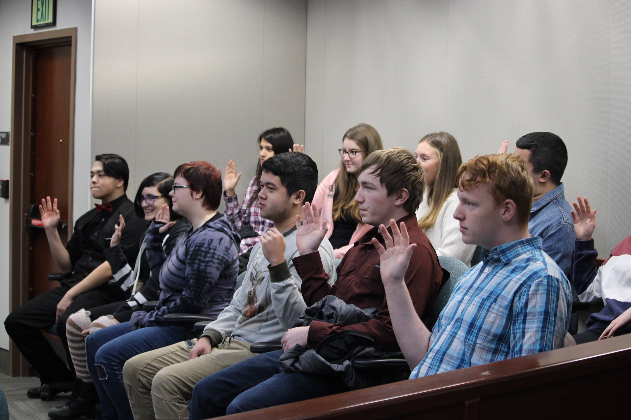 Nikiski Middle/High School seniors are sworn in as the jury during a mock trial at the Kenai Courthouse on Dec. 3, 2019. (Photo by Brian Mazurek/Peninsula Clarion)