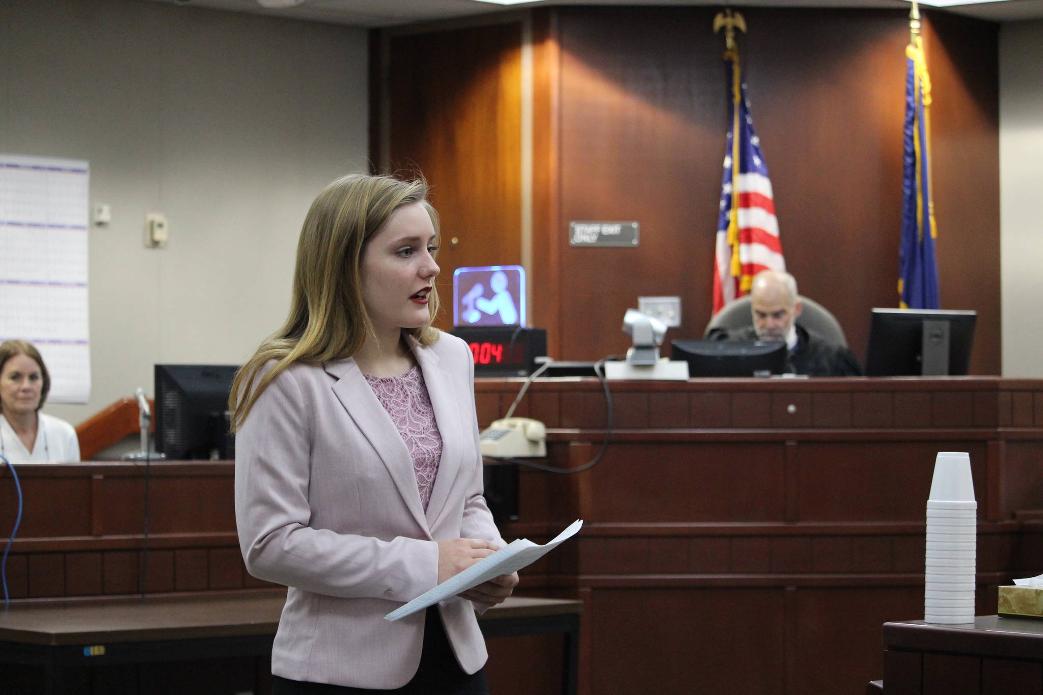 Nikiski Middle/High School senior Elora Reichert, in her role as prosecutor, gives an opening statement to the jury during a mock trial at the Kenai Courthouse on Dec. 3, 2019. (Photo by Brian Mazurek/Peninsula Clarion)