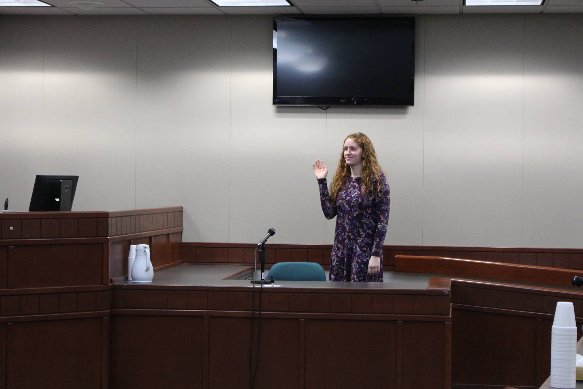 Nikiski Middle/High School senior Kaycee Bostic is sworn in to the witness stand during a mock trial at the Kenai Courthouse on Dec. 3, 2019. (Photo by Brian Mazurek/Peninsula Clarion)