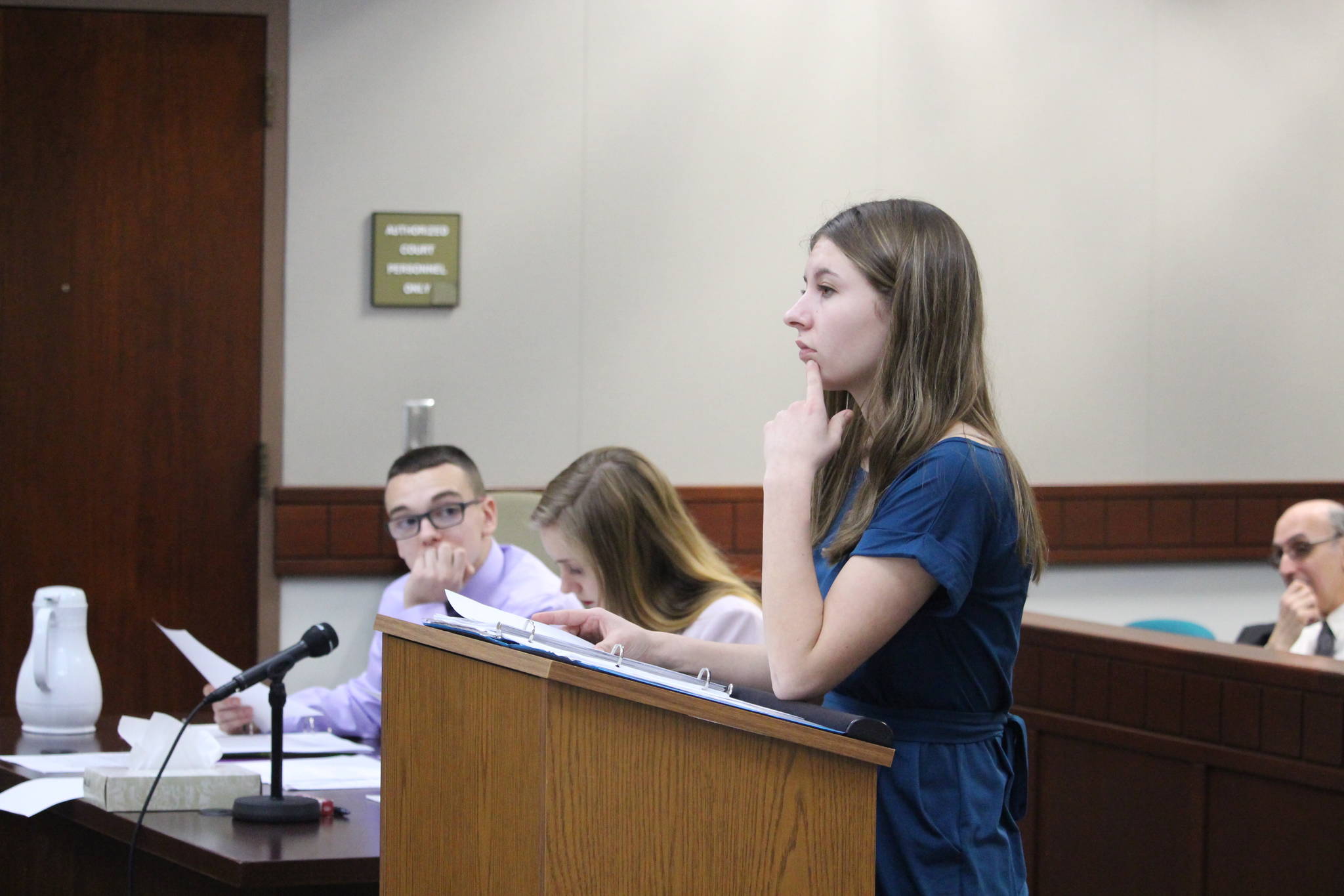 Nikiski Middle/High School senior America Jeffreys, in her role as defense attorney, questions a witness during a mock trial at the Kenai Courthouse on Dec. 3, 2019. (Photo by Brian Mazurek/Peninsula Clarion)
