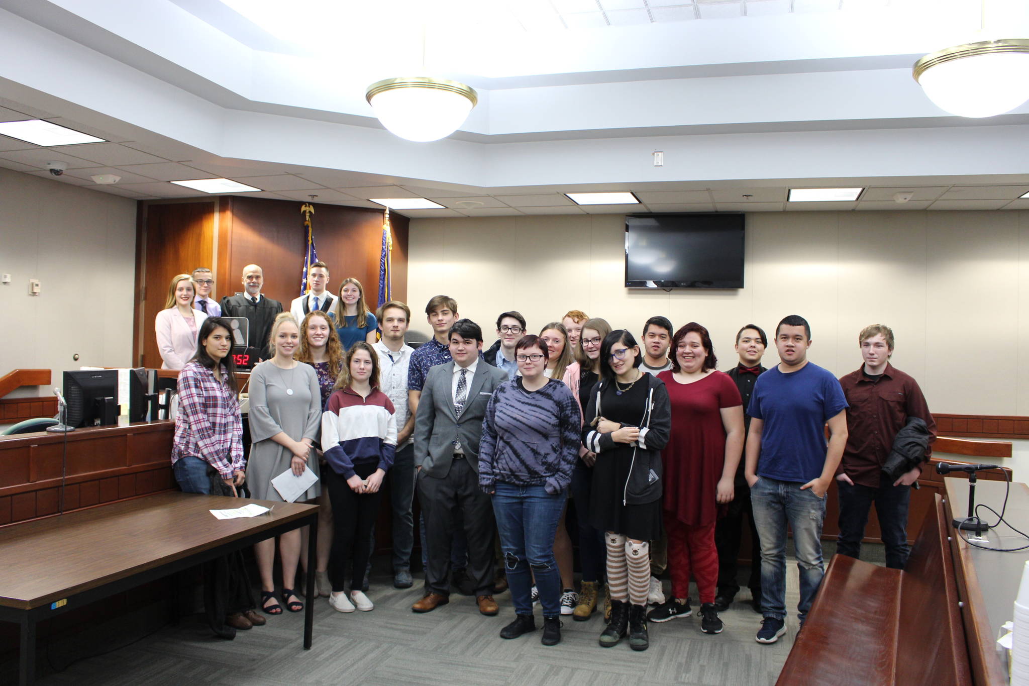 Nikiski Middle/High School seniors pose for a group photo during a mock trial at the Kenai Courthouse on Dec. 3, 2019. (Photo by Brian Mazurek/Peninsula Clarion)