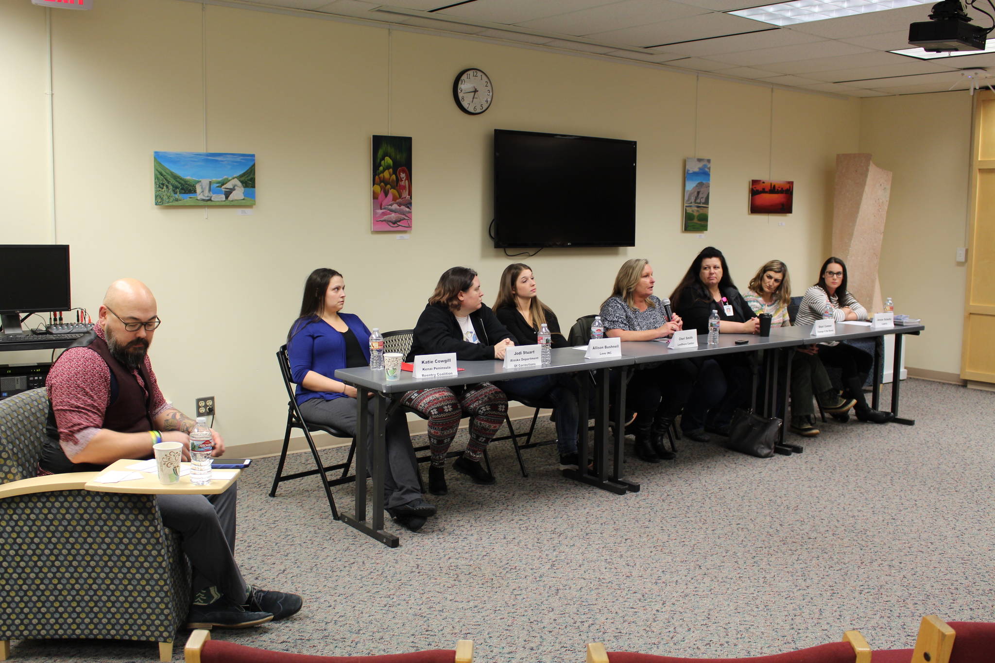 Representatives from local nonprofits and government agencies participate in a community panel on Restorative Reentry at the Kenai Peninsula College on Thursday. (Photo by Brian Mazurek)