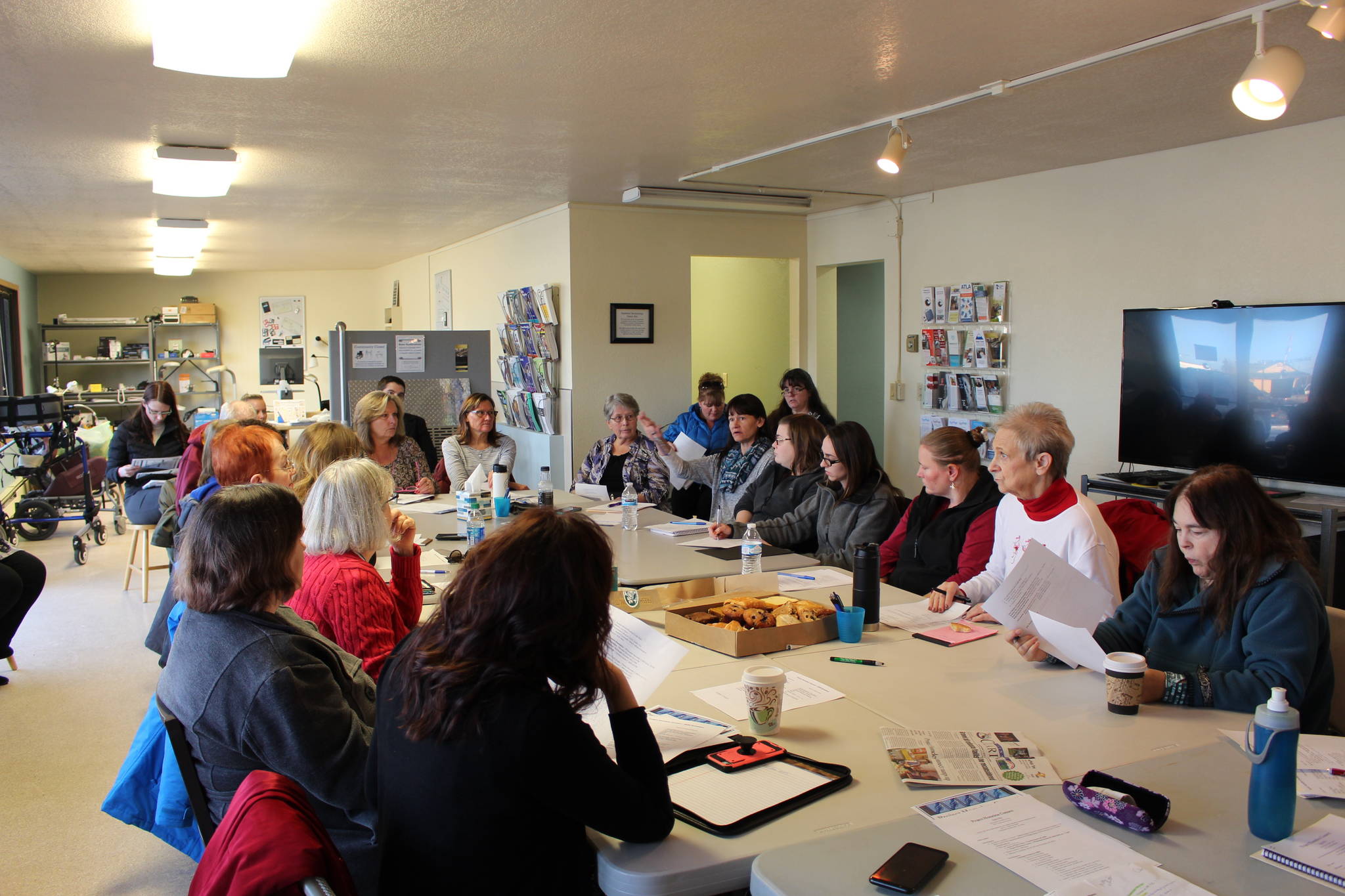 Organizers for Project Homeless Connect meet at the Independent Living Center in Kalifornsky, Alaska on Dec. 10, 2019. (Photo by Brian Mazurek/Peninsula Clarion)