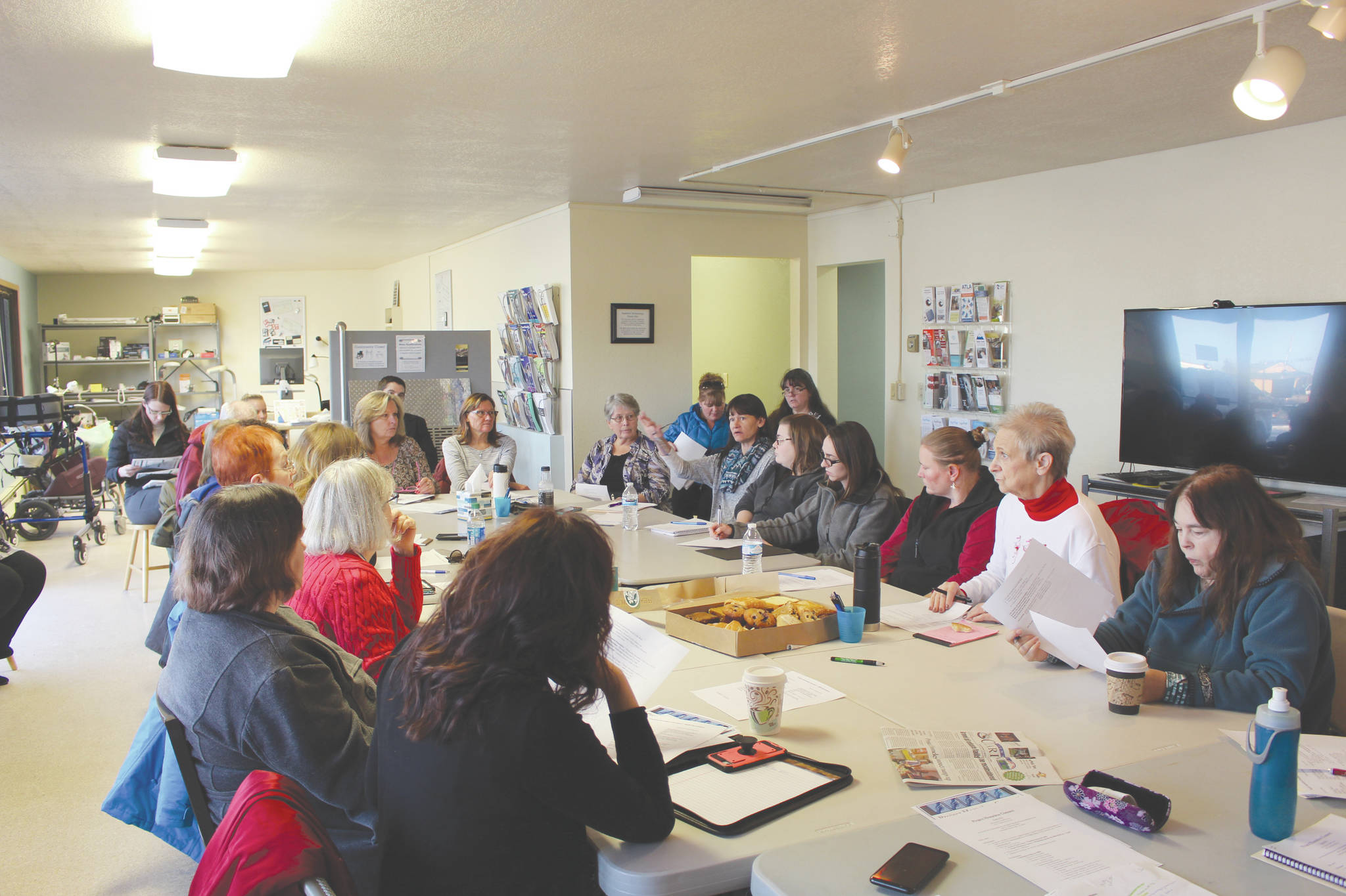 Brian Mazurek / Peninsula Clarion                                Organizers for Project Homeless Connect meet Tuesday at the Independent Living Center in Kalifornsky.