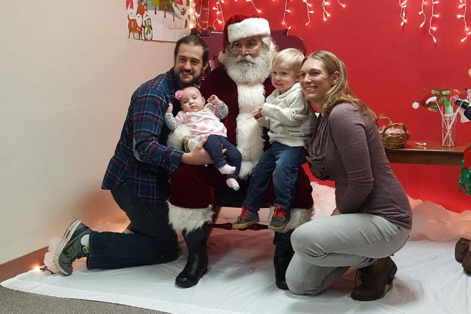 North Peninsula Recreation Service Area                                Nikiski residents pose with Santa Claus during Christmas Comes to Nikiski at the Nikiski Community Recreation Center on Dec. 9.