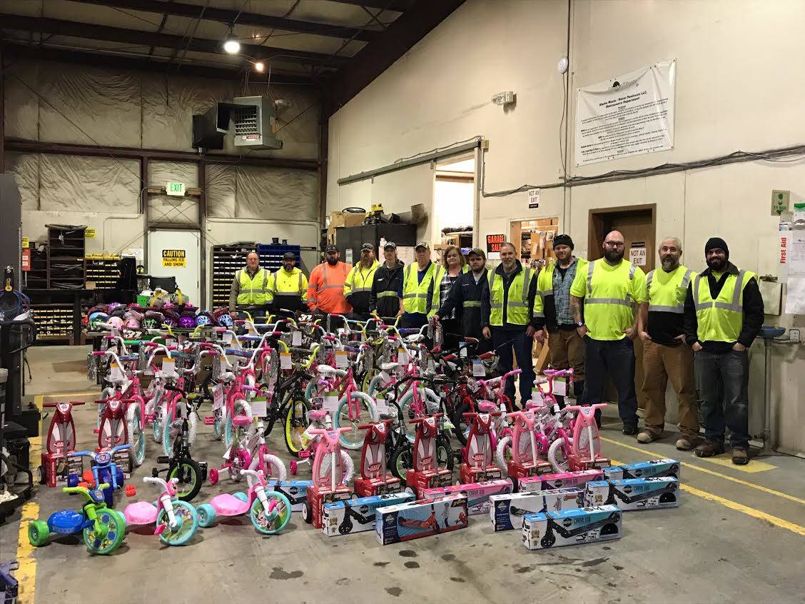 Josue Rivera-Cruz / Alaska Waste                                The Alaska Waste team in Kenai built more than 60 bikes to give to area children this holiday season.