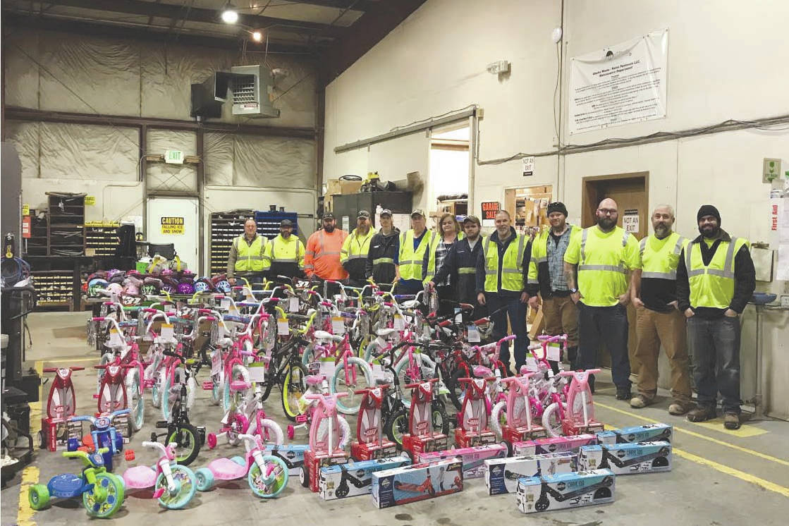 Alaska Waste team in Kenai builds more than 60 bikes to give to area children this holiday season. (Photo by Alaska Waste Kenai operations manager Josue Rivera-Cruz/provided by Alaska Waste)                                Alaska Waste team in Kenai builds more than 60 bikes to give to area children this holiday season. (Photo by Alaska Waste Kenai operations manager Josue Rivera-Cruz/provided by Alaska Waste)