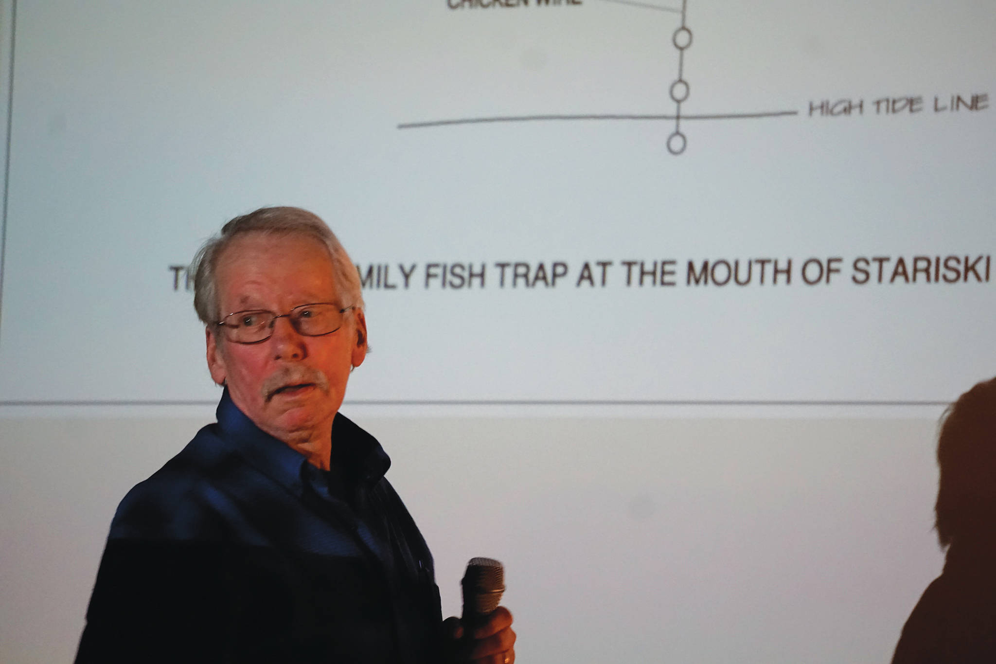 Steve Walli speaks Dec. 12, 2019, at “Homestead Kids 3,” at the annual meeting of the Kachemak Heritage Land Trust at the Alaska Islands and Ocean Visitor Center in Homer, Alaska. (Photo by Michael Armstrong/Homer News)