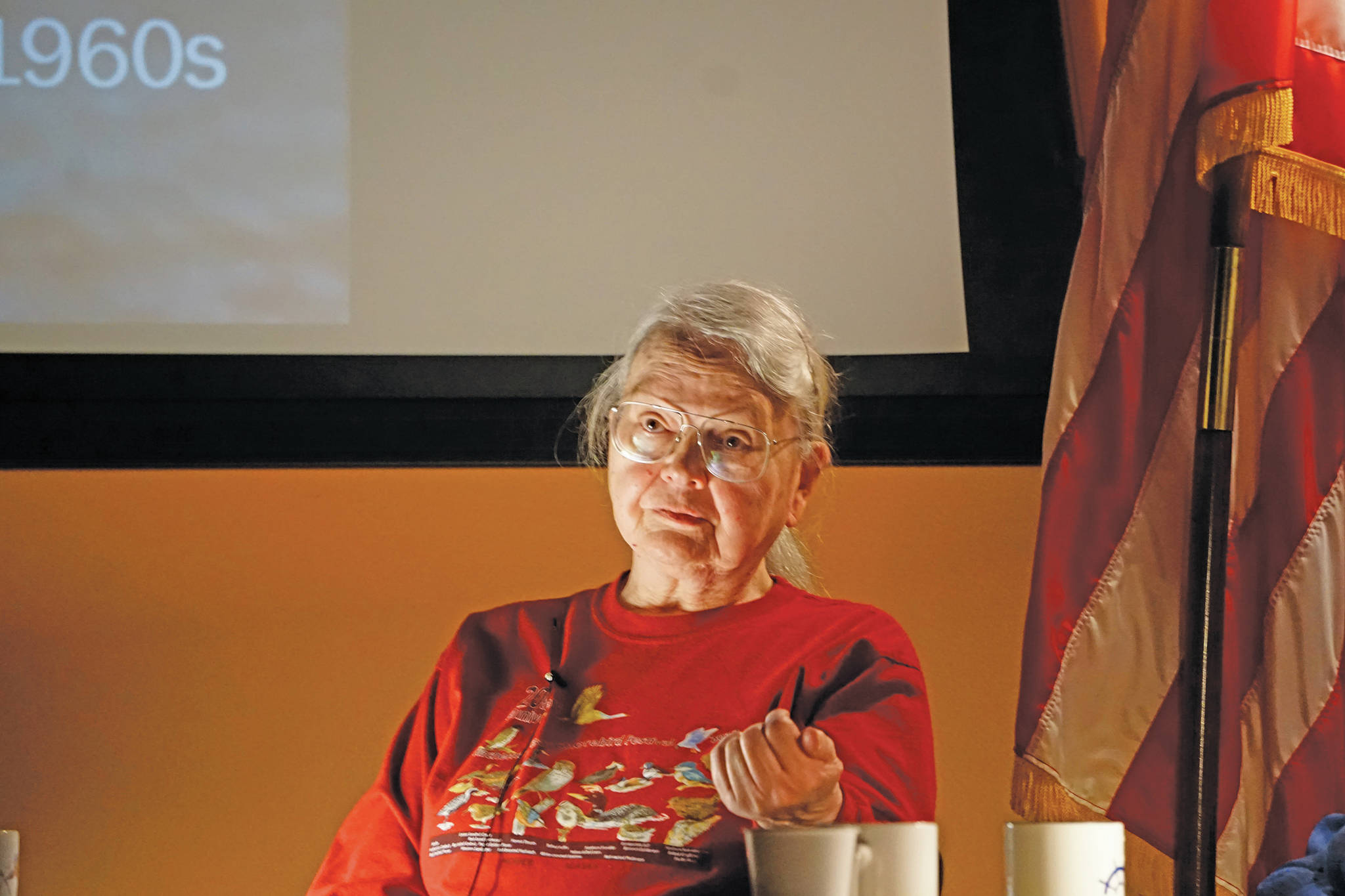 Laura Lofgren Barton speaks Dec. 12, 2019, at “Homestead Kids 3,” at the annual meeting of the Kachemak Heritage Land Trust at the Alaska Islands and Ocean Visitor Center in Homer, Alaska. (Photo by Michael Armstrong/Homer News)